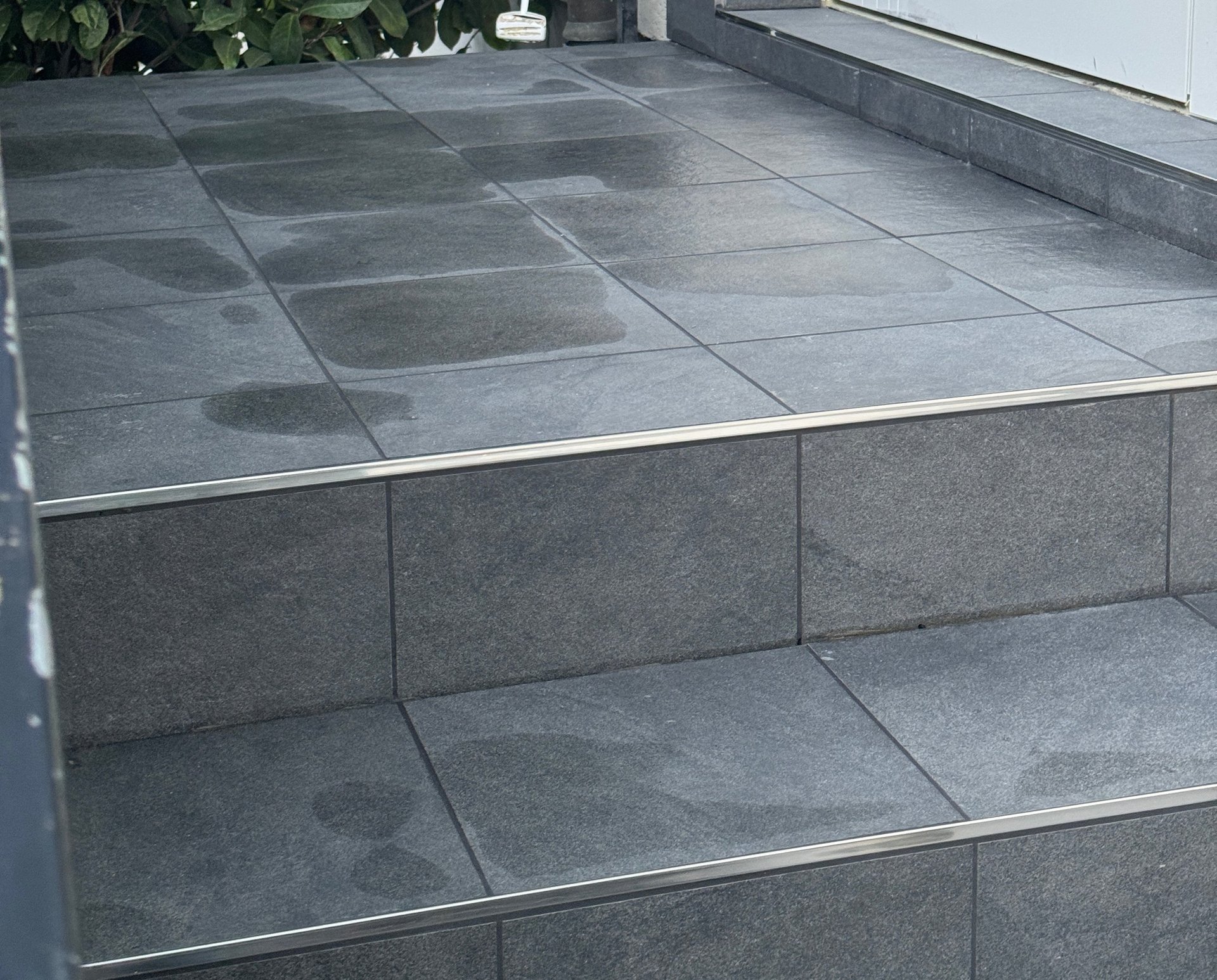 black and brown leather padded tub sofa