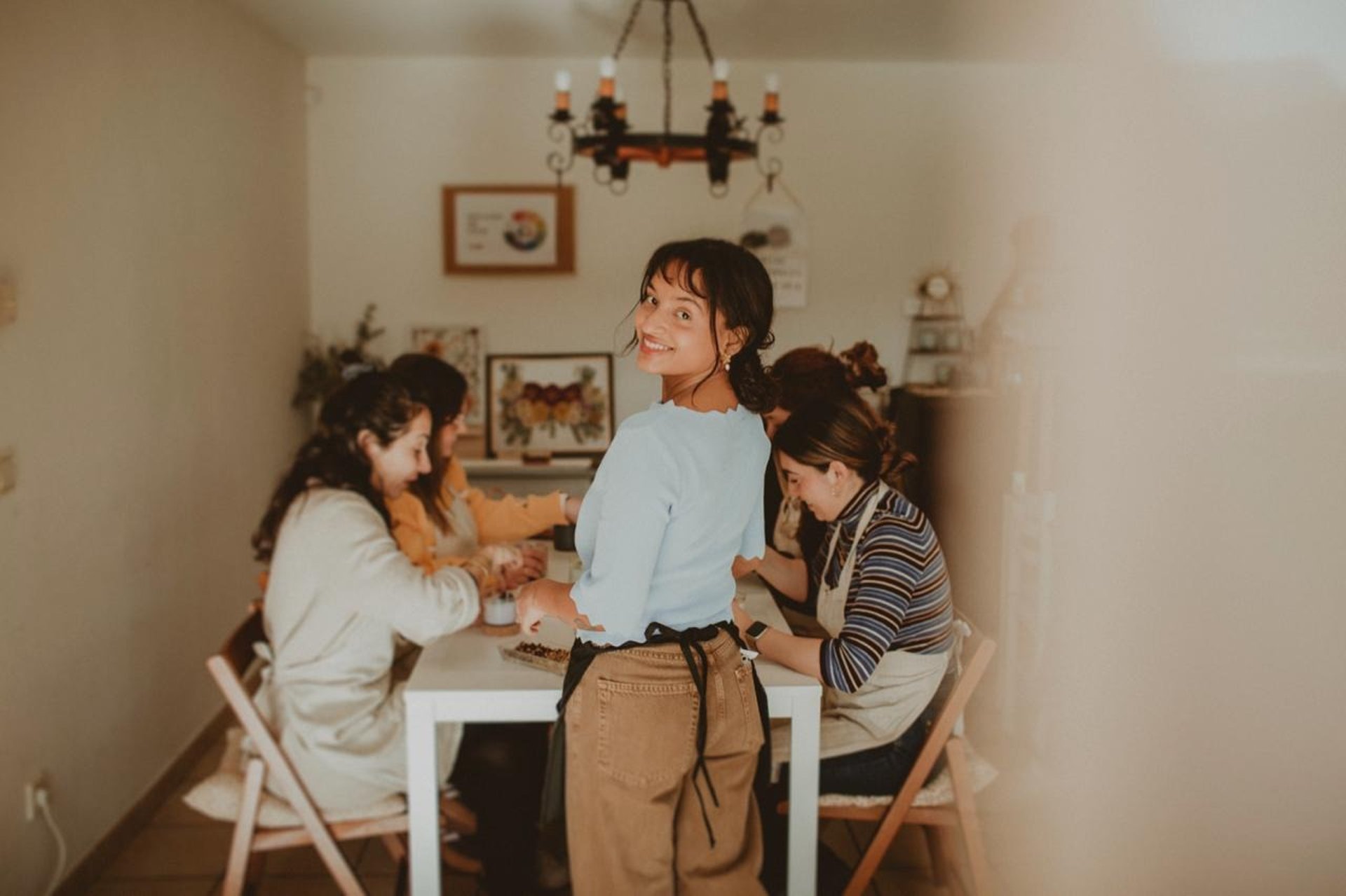 woman holding dried flower