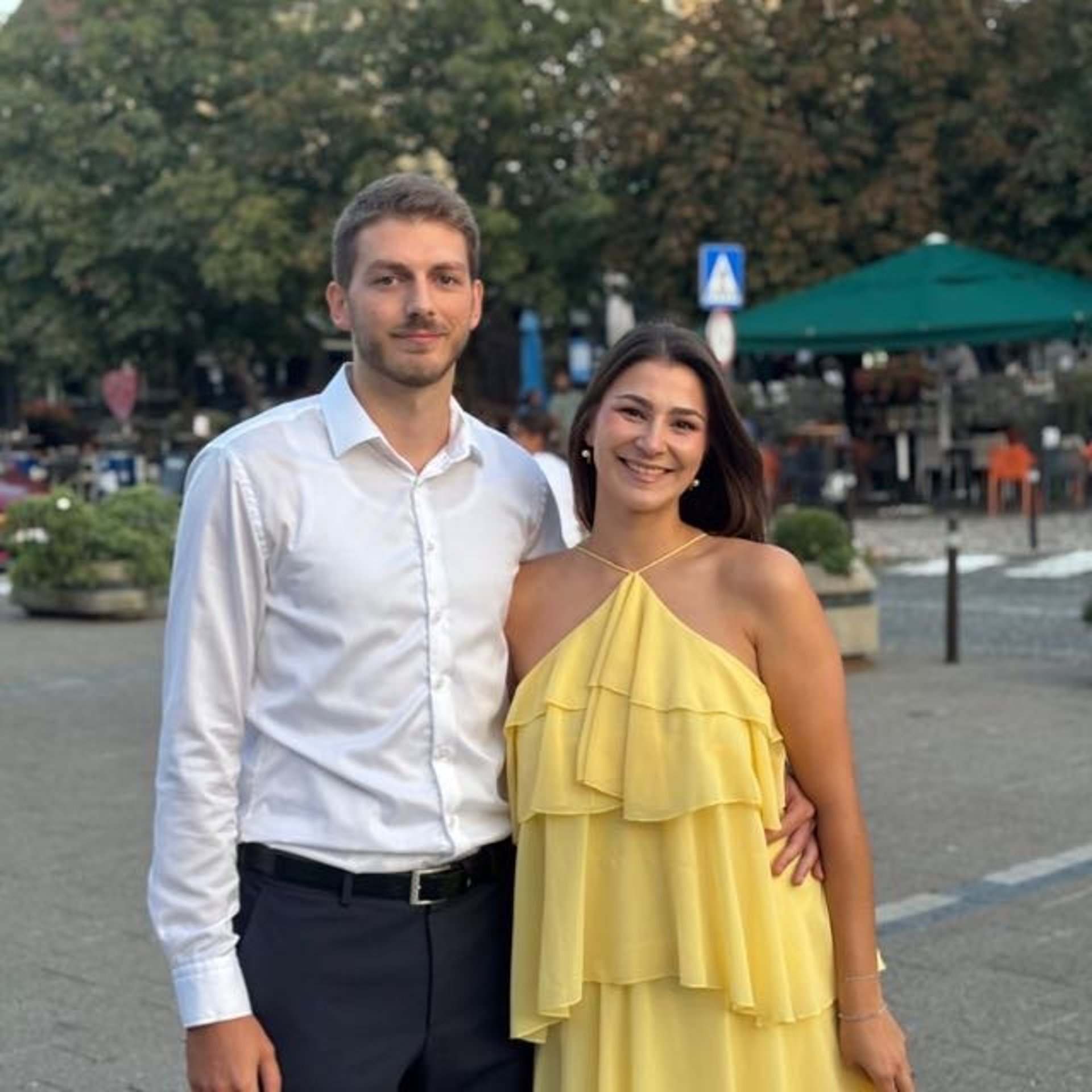 couple wearing silver-colored rings