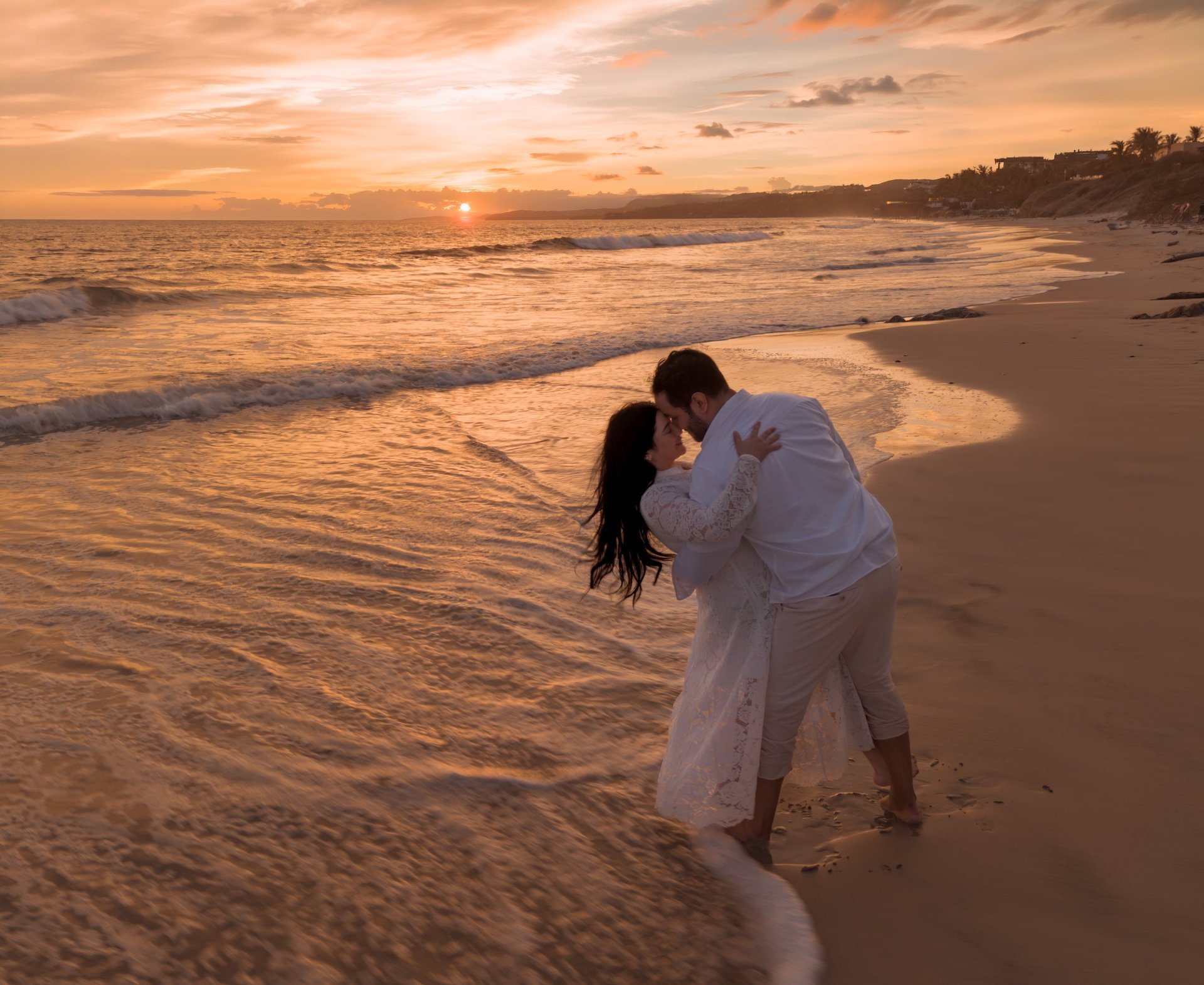 couple wearing silver-colored rings