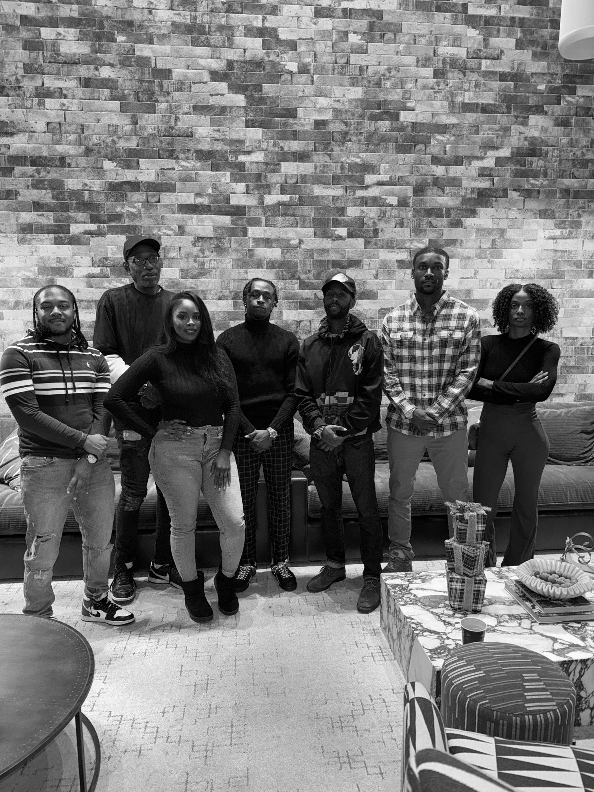 black and brown leather padded tub sofa