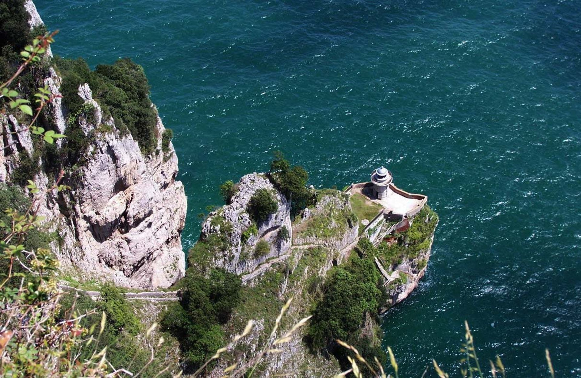 woman wearing yellow long-sleeved dress under white clouds and blue sky during daytime