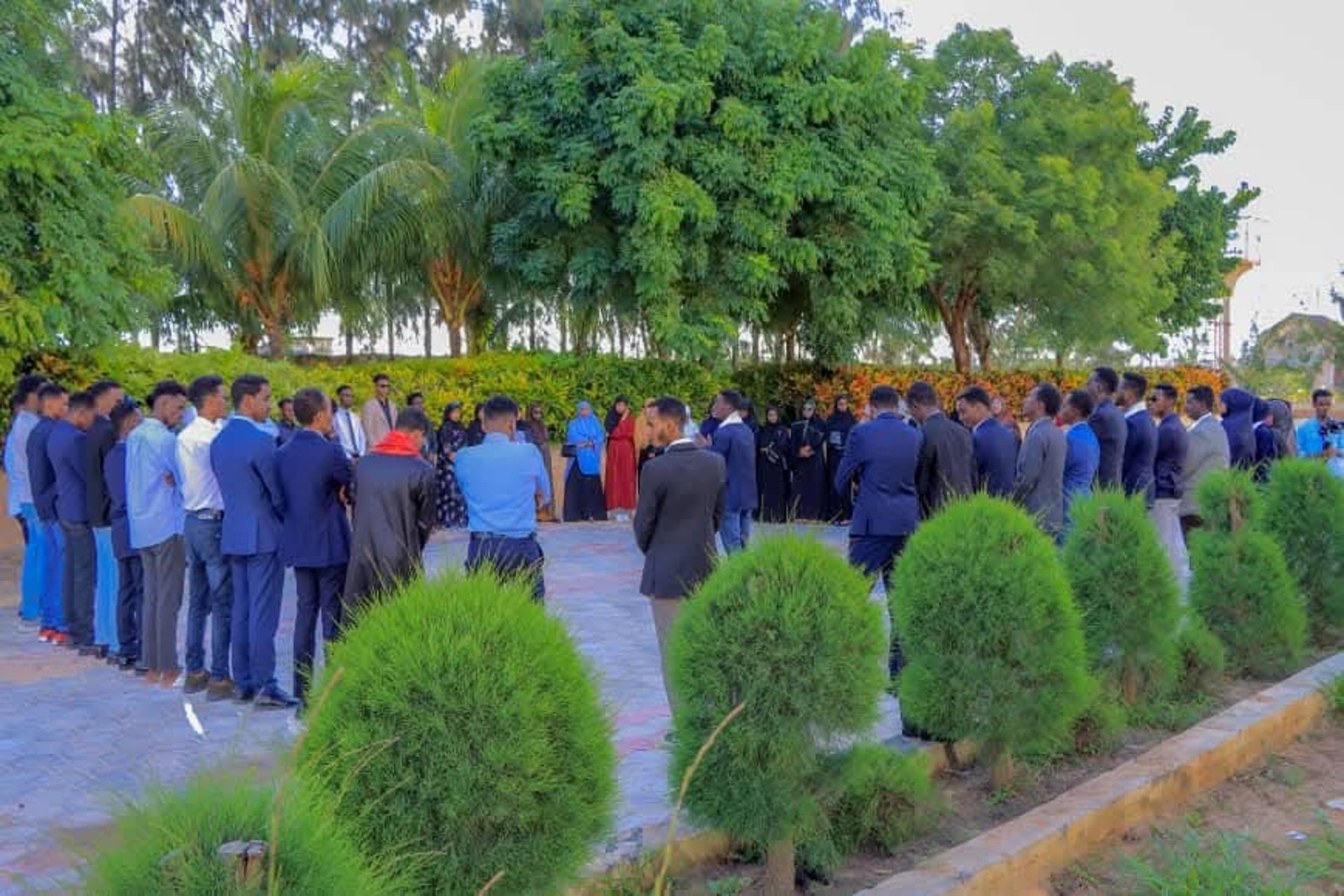 woman wearing yellow long-sleeved dress under white clouds and blue sky during daytime