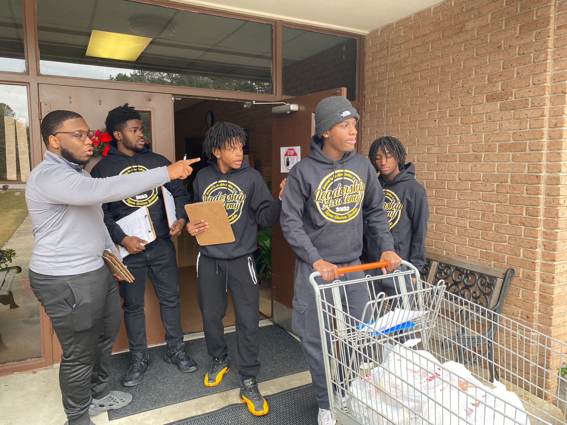 black and brown leather padded tub sofa