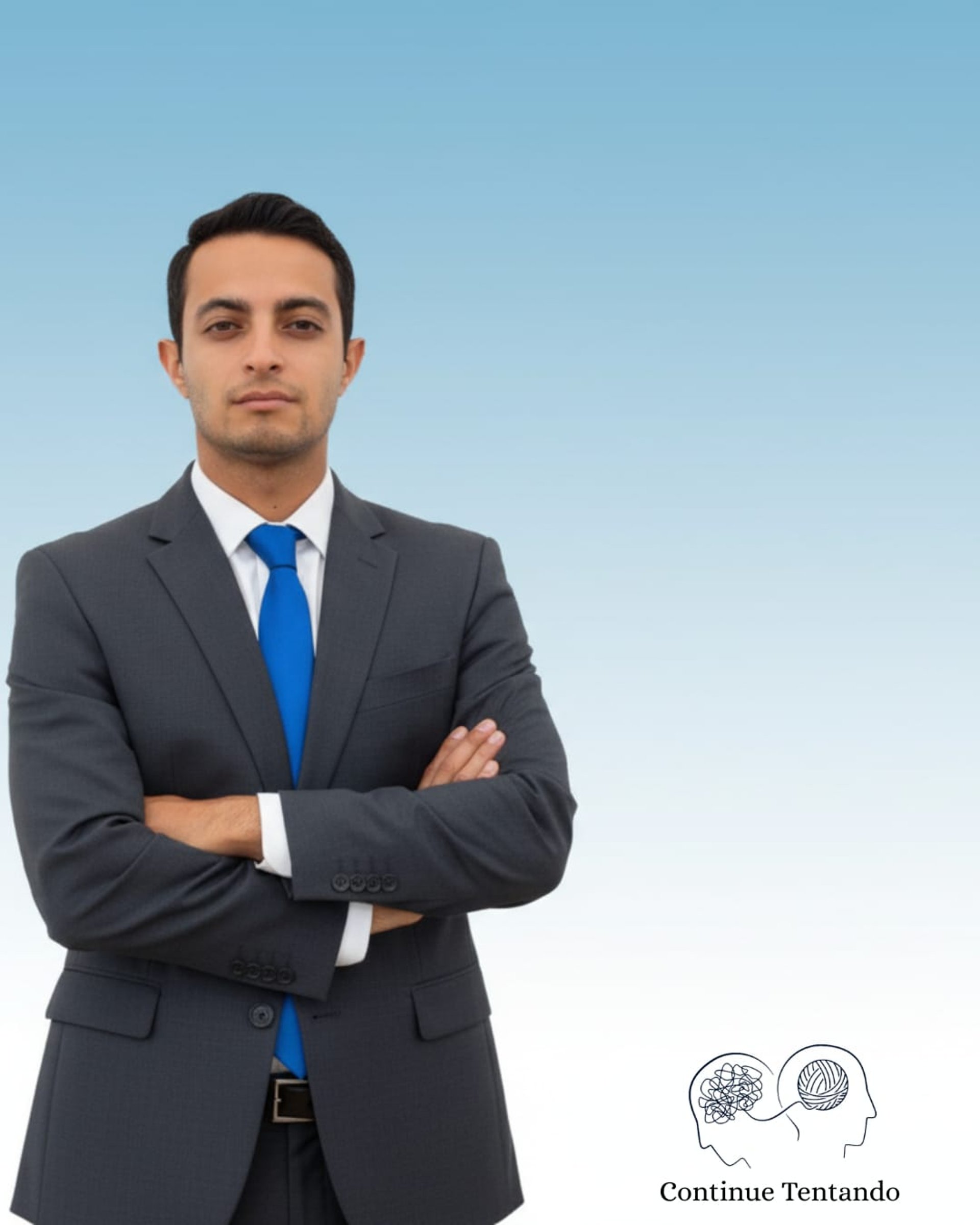 a sandy beach next to the ocean under a blue sky