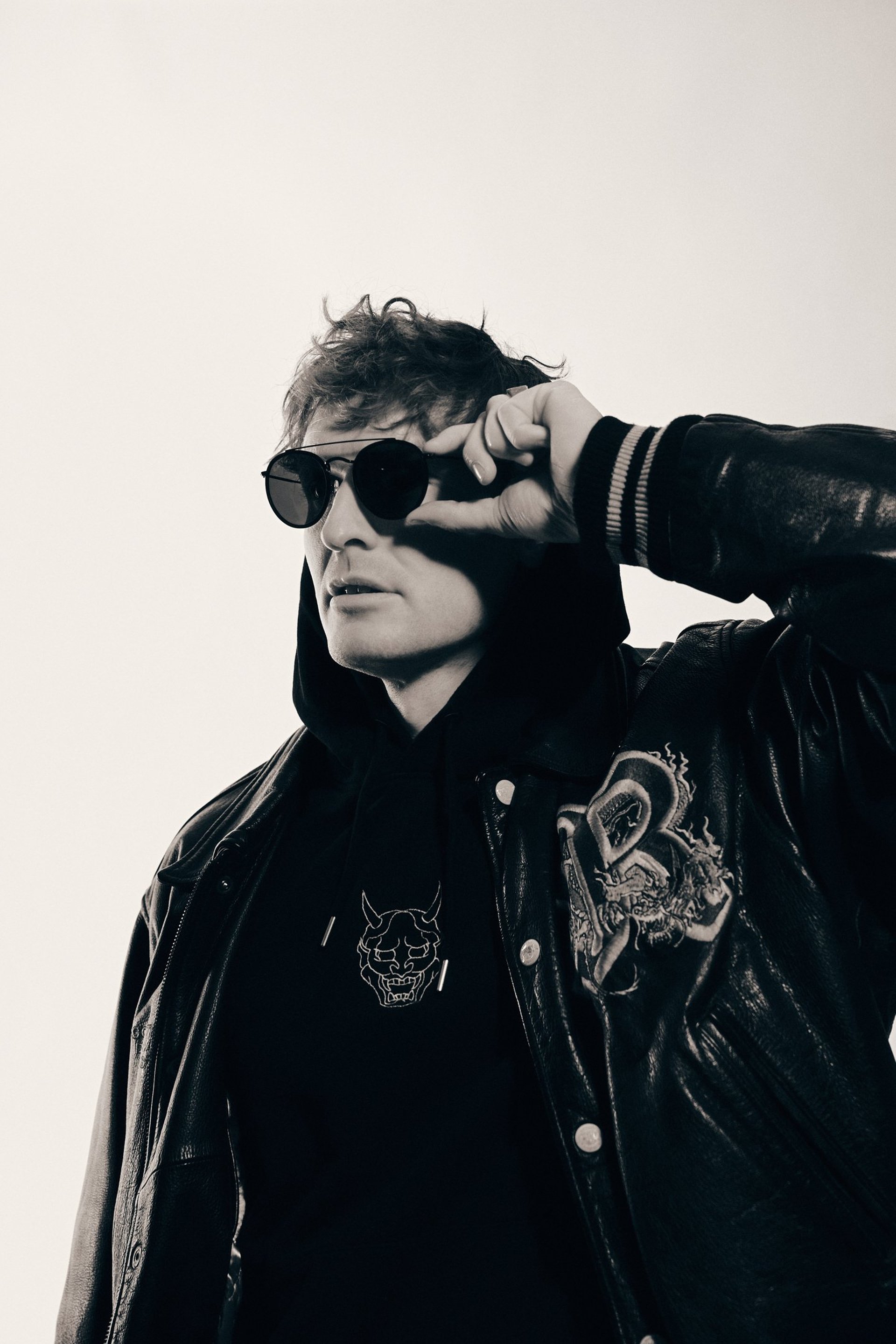 an abstract photo of a curved building with a blue sky in the background