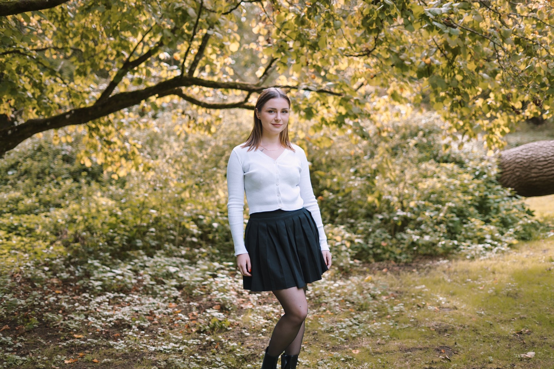 an abstract photo of a curved building with a blue sky in the background