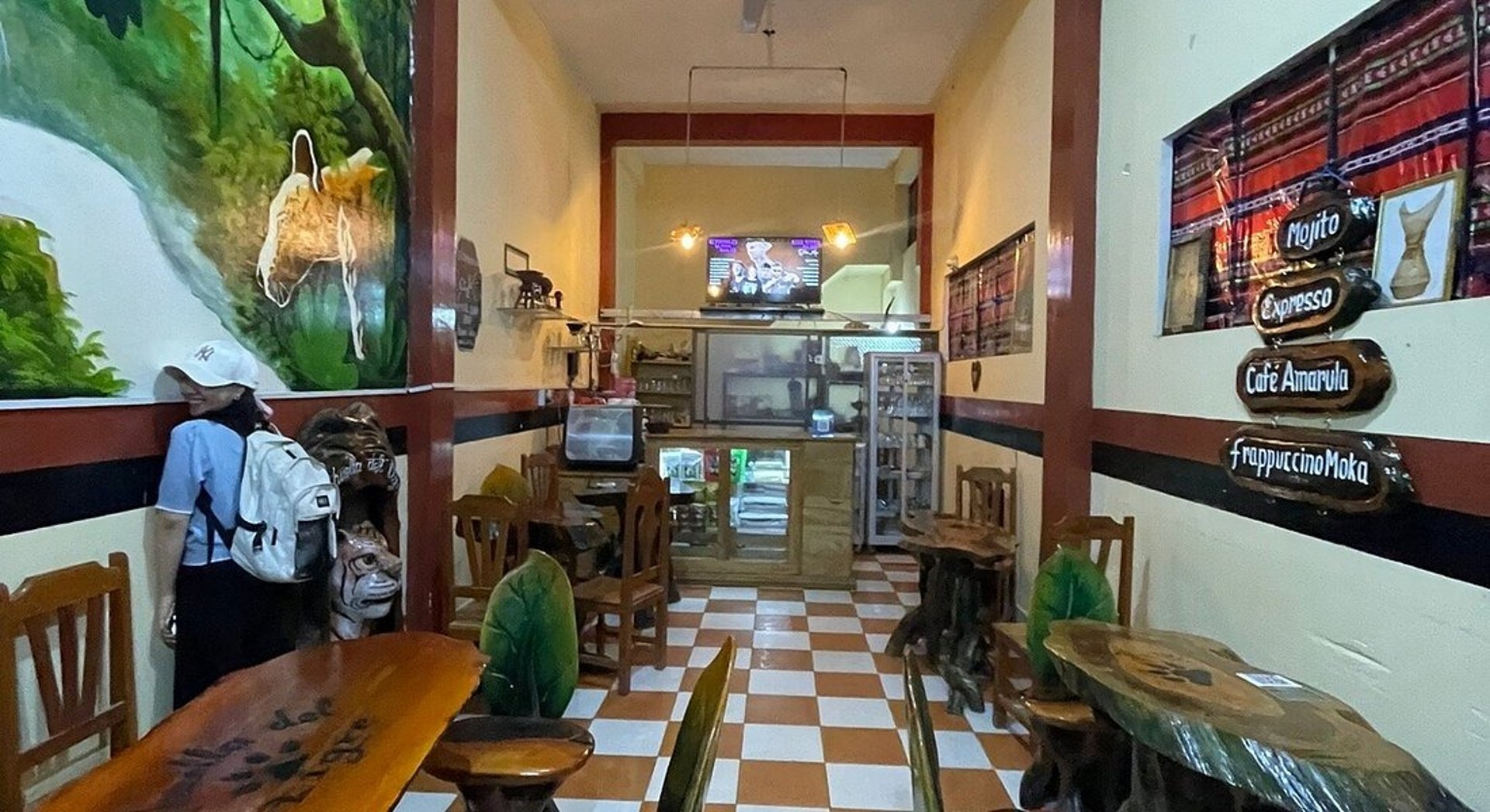 an abstract photo of a curved building with a blue sky in the background
