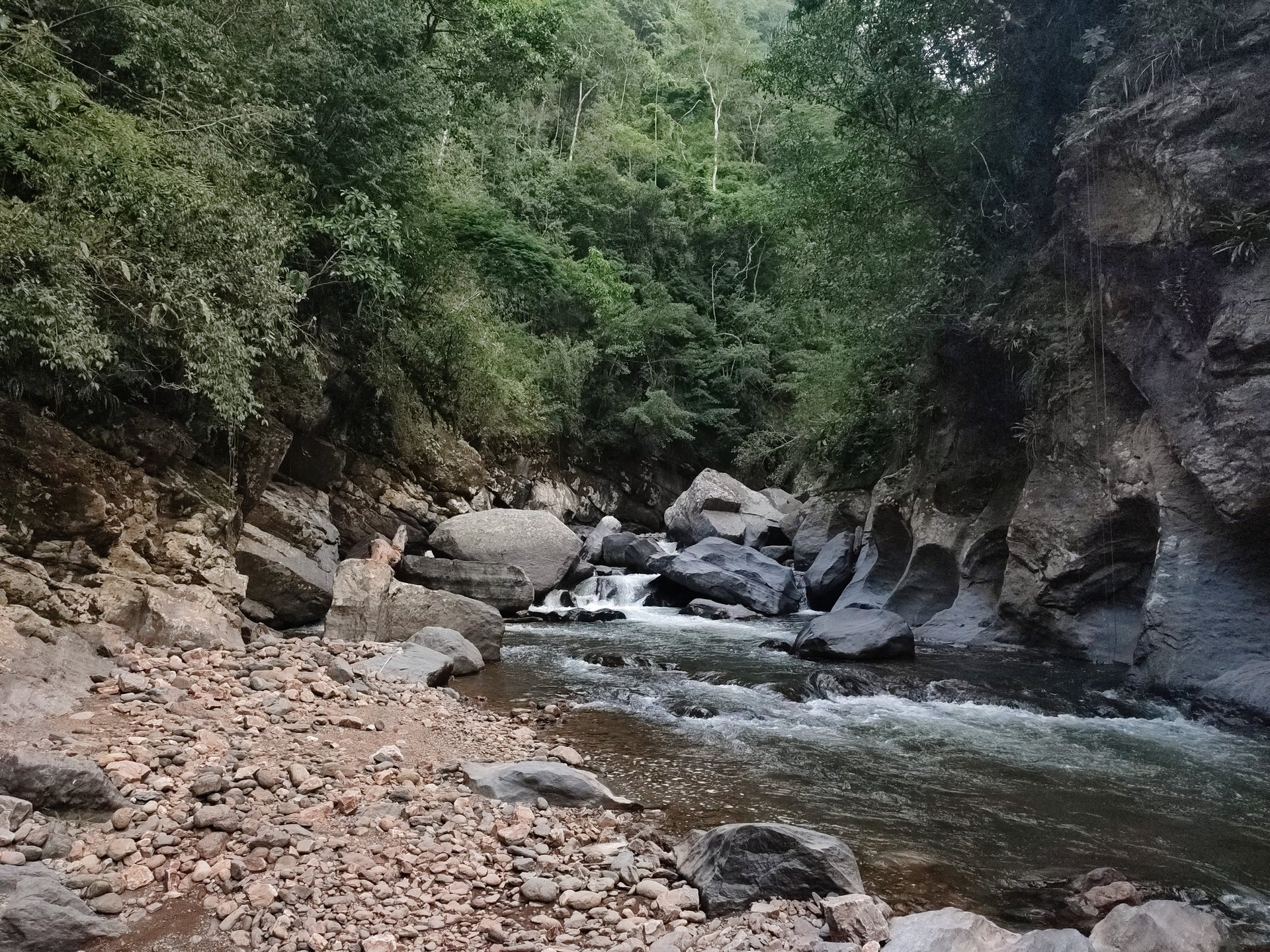 an abstract photo of a curved building with a blue sky in the background