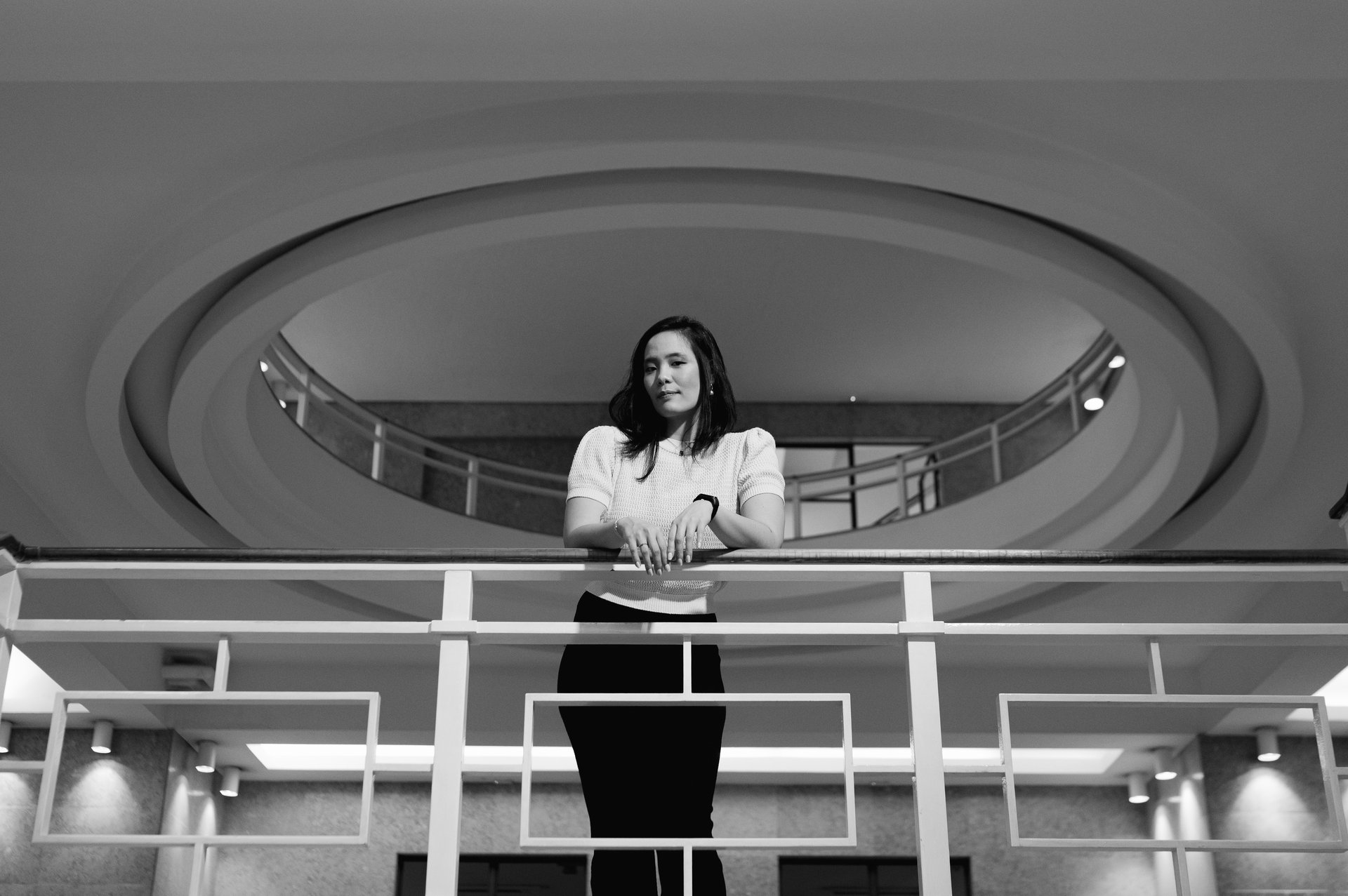 black and brown leather padded tub sofa