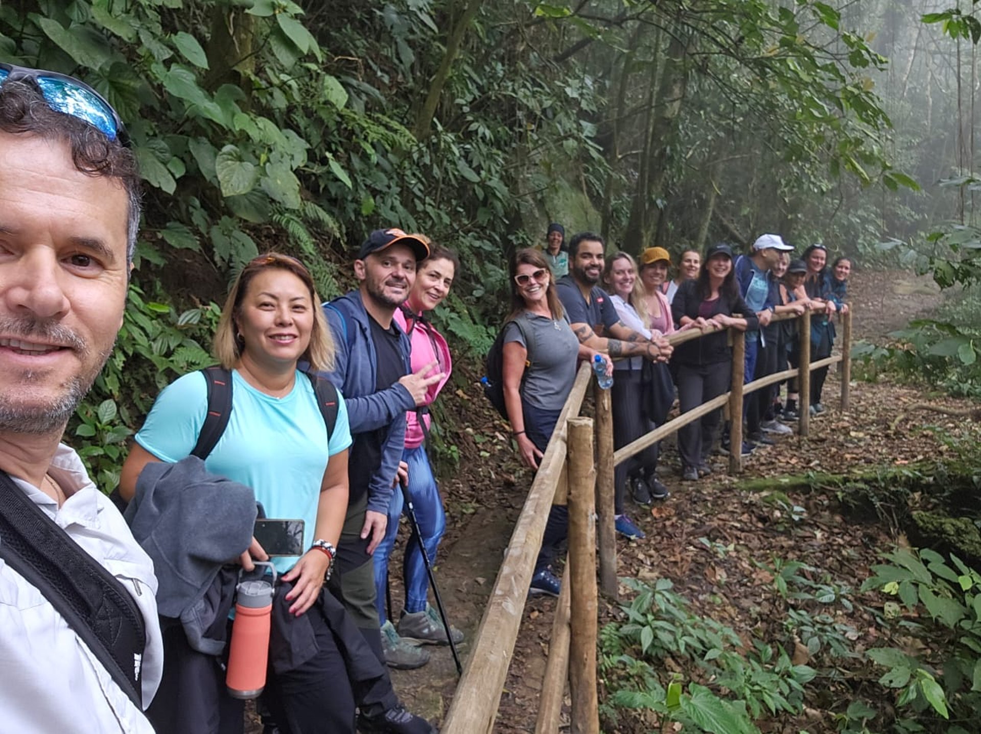 woman wearing yellow long-sleeved dress under white clouds and blue sky during daytime