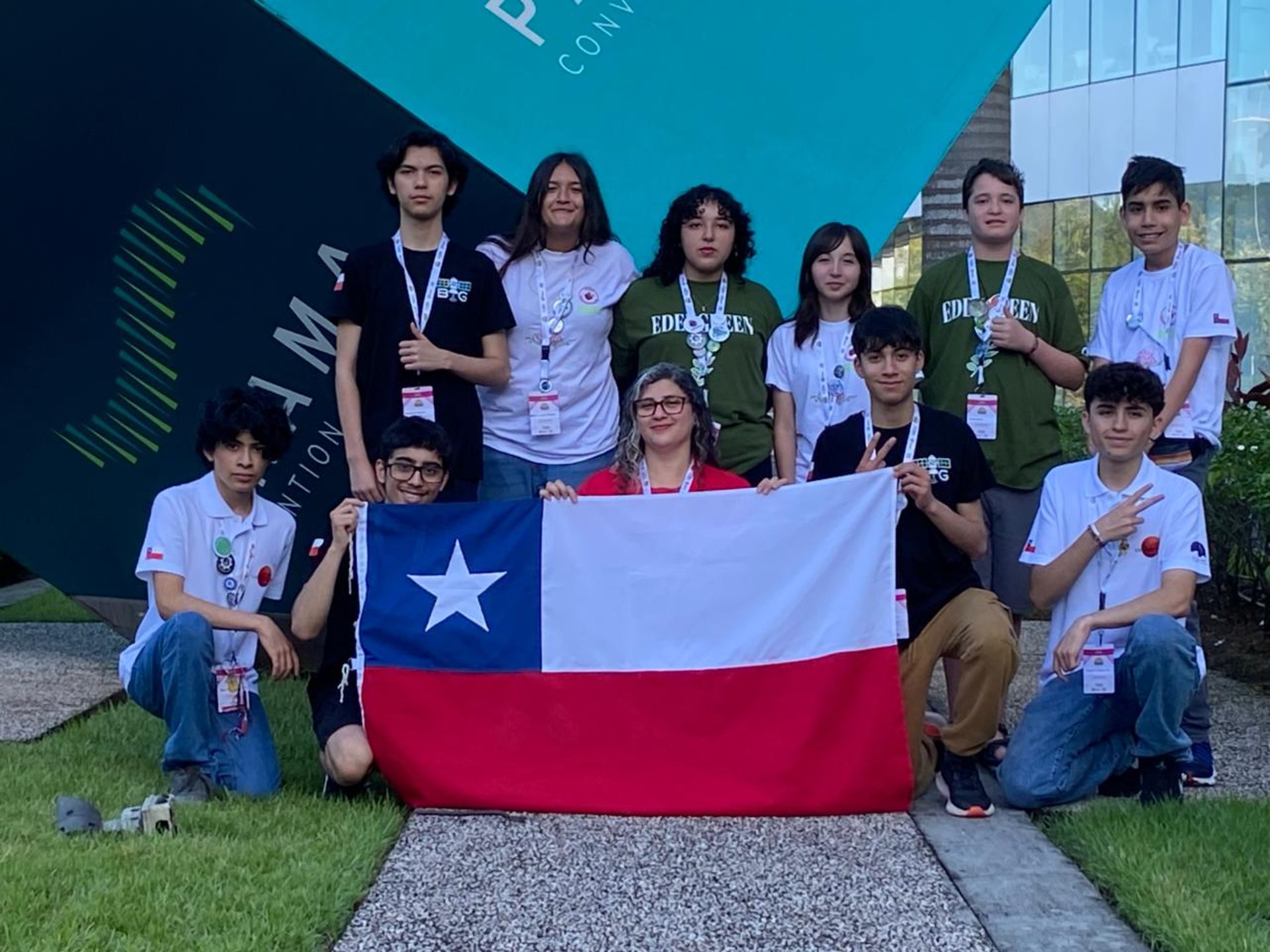 an abstract photo of a curved building with a blue sky in the background