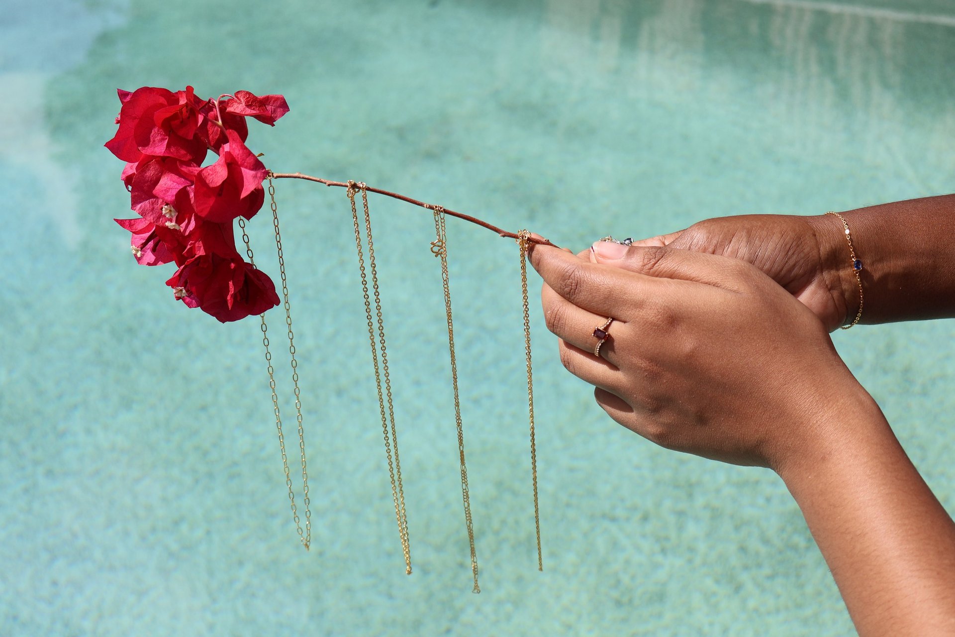 woman in black pants standing on window during daytime