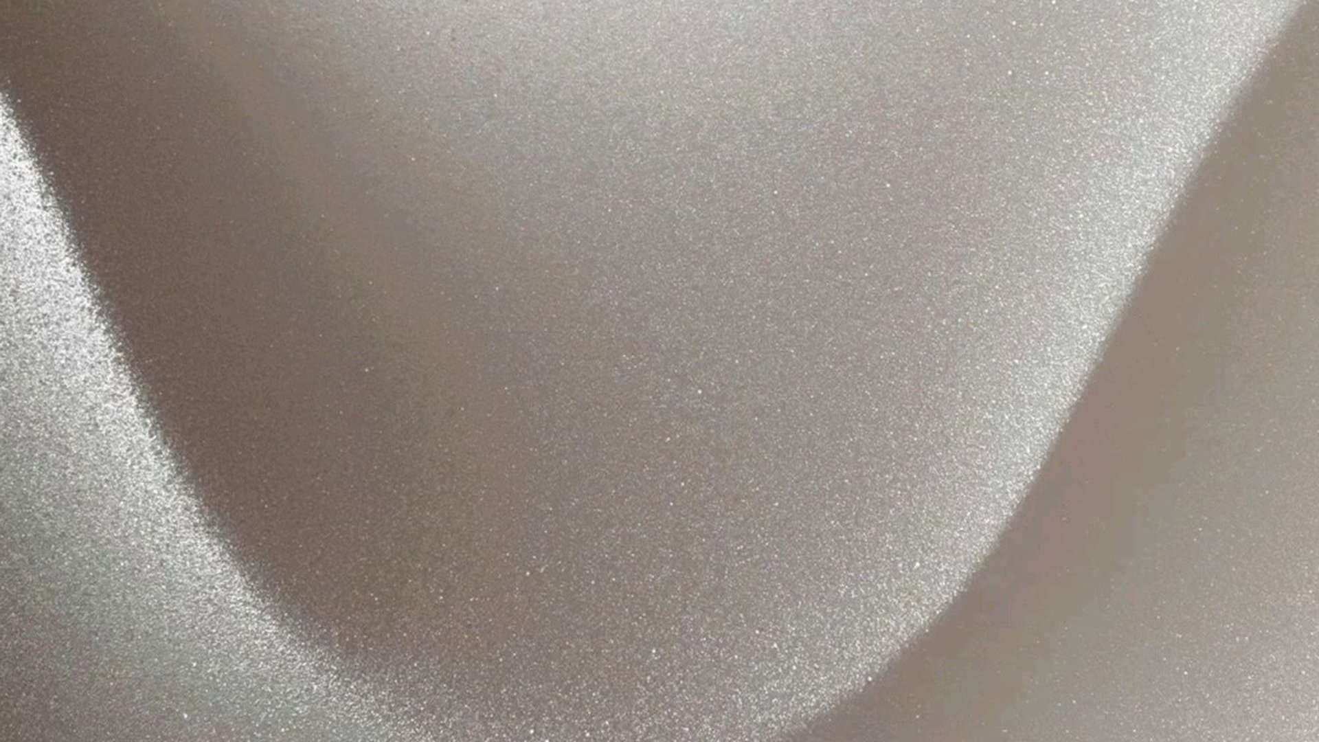 person wearing grey knit sweater