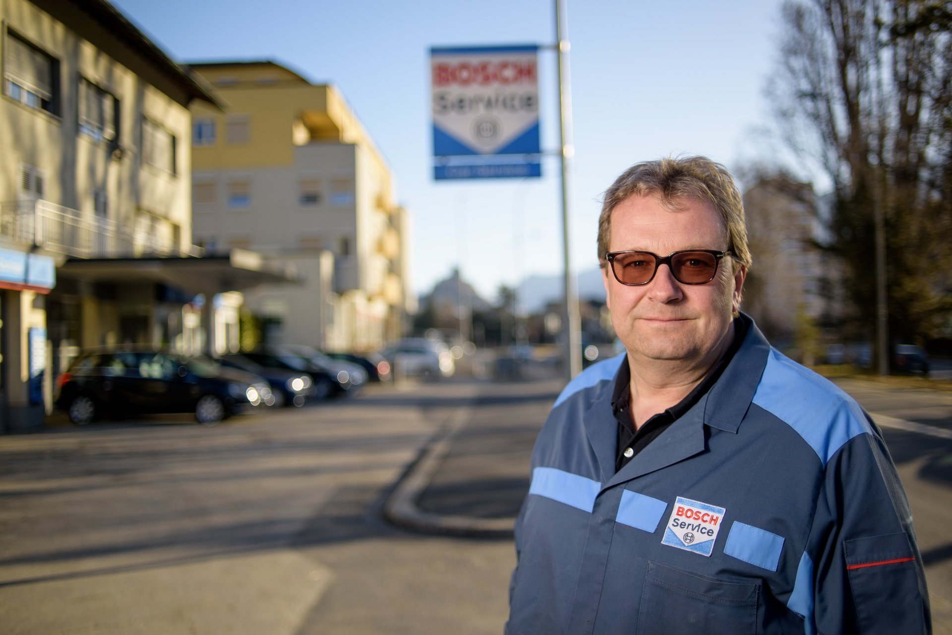 an abstract photo of a curved building with a blue sky in the background