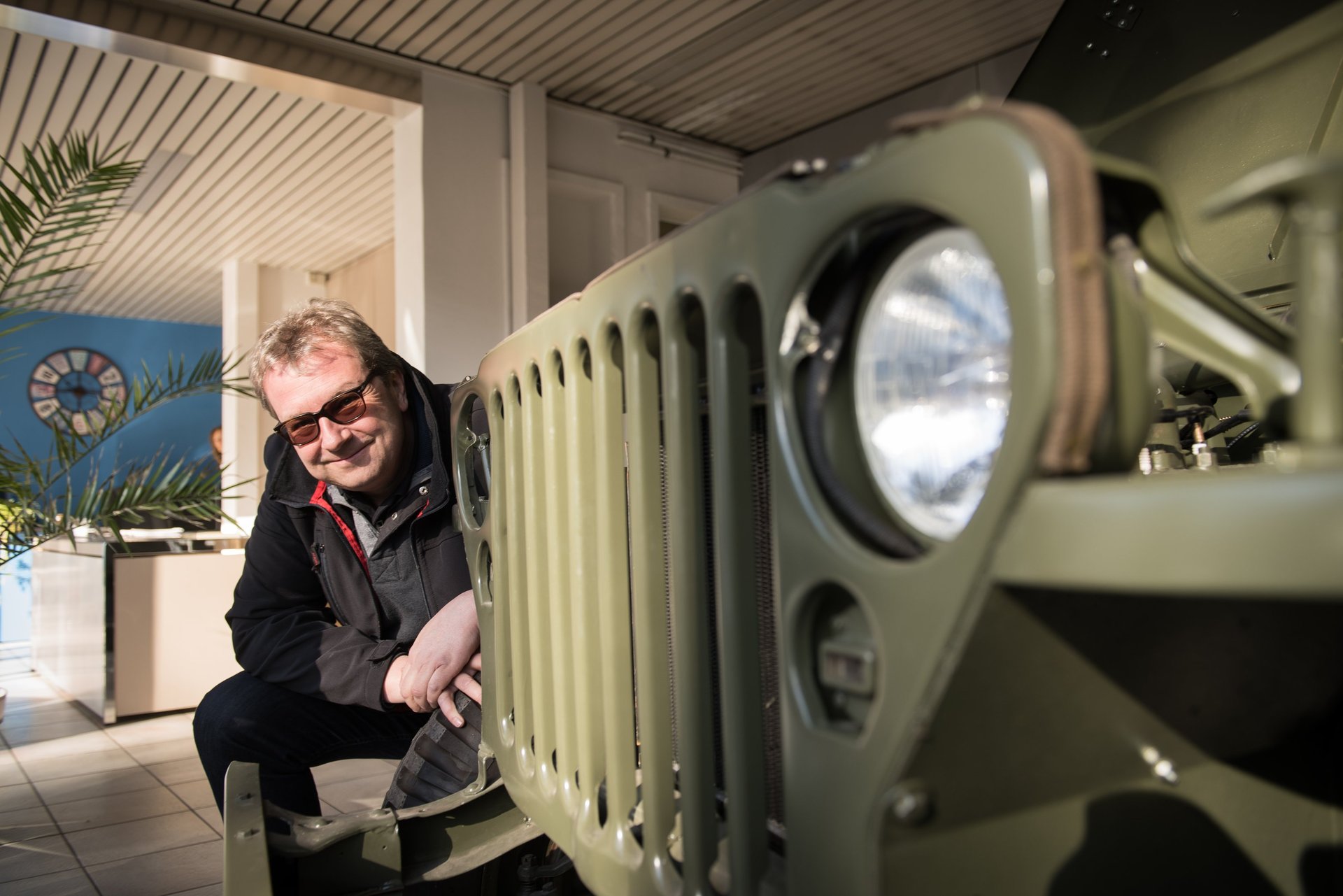 an abstract photo of a curved building with a blue sky in the background