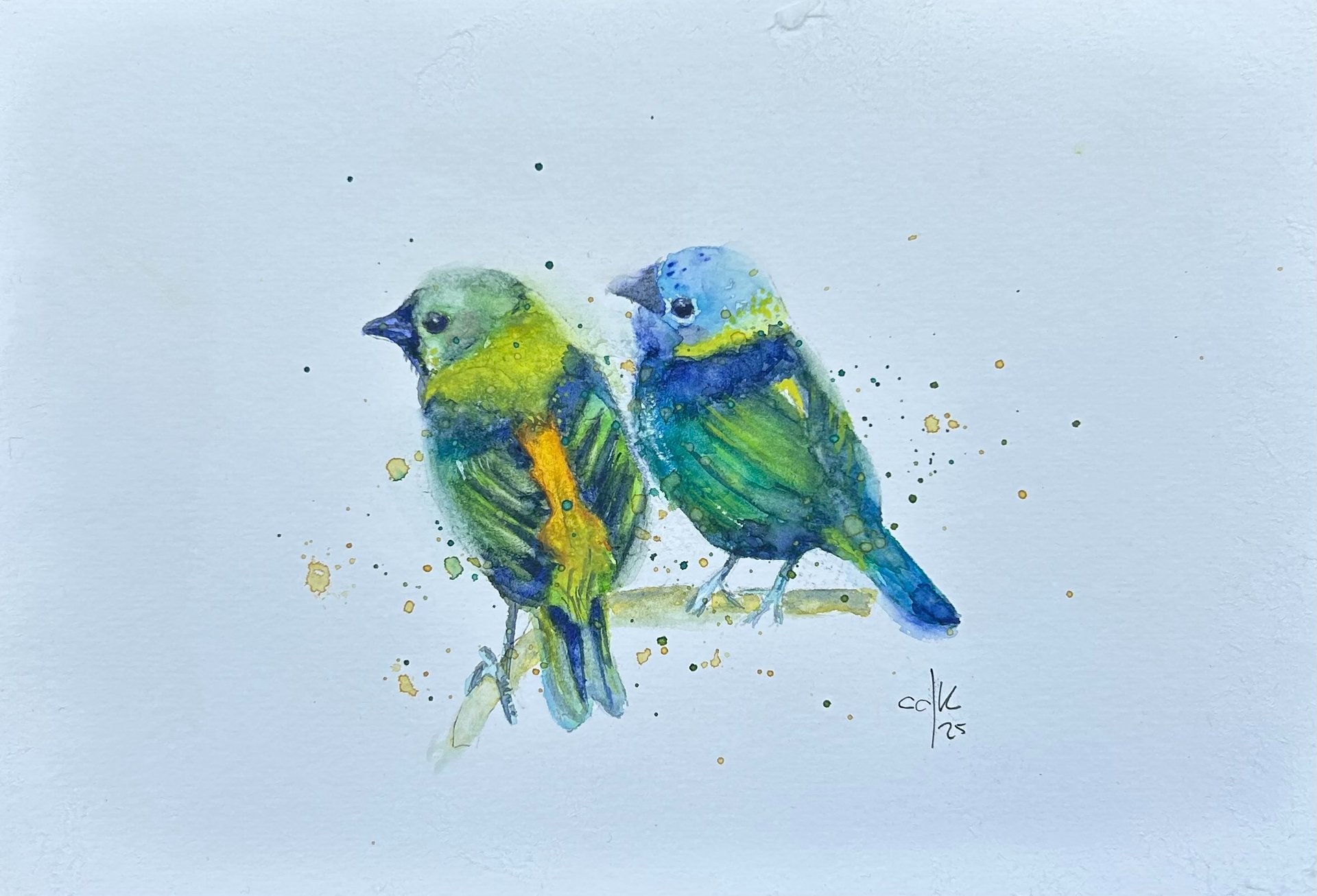 blue hair brushes in vase