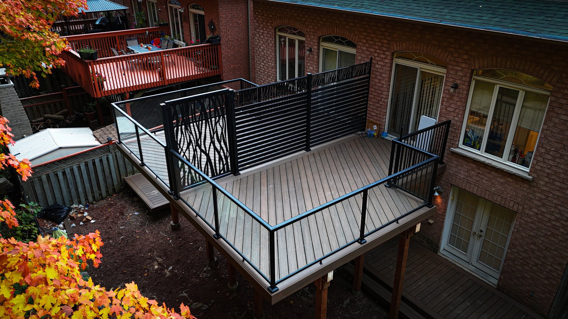 black and brown leather padded tub sofa