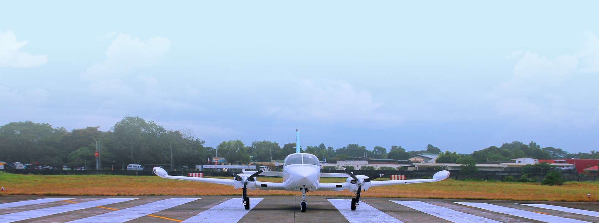 an abstract photo of a curved building with a blue sky in the background