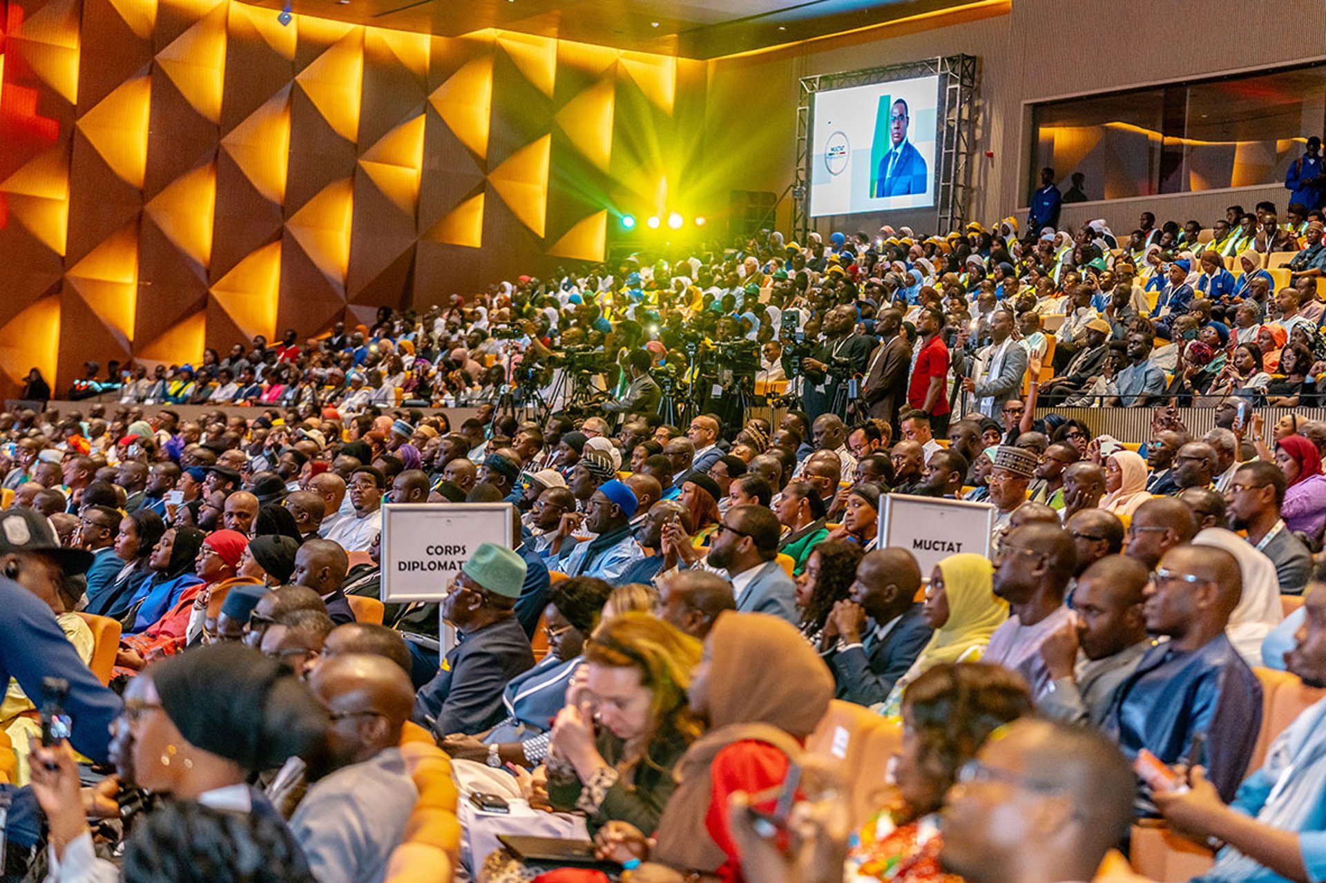 an abstract photo of a curved building with a blue sky in the background