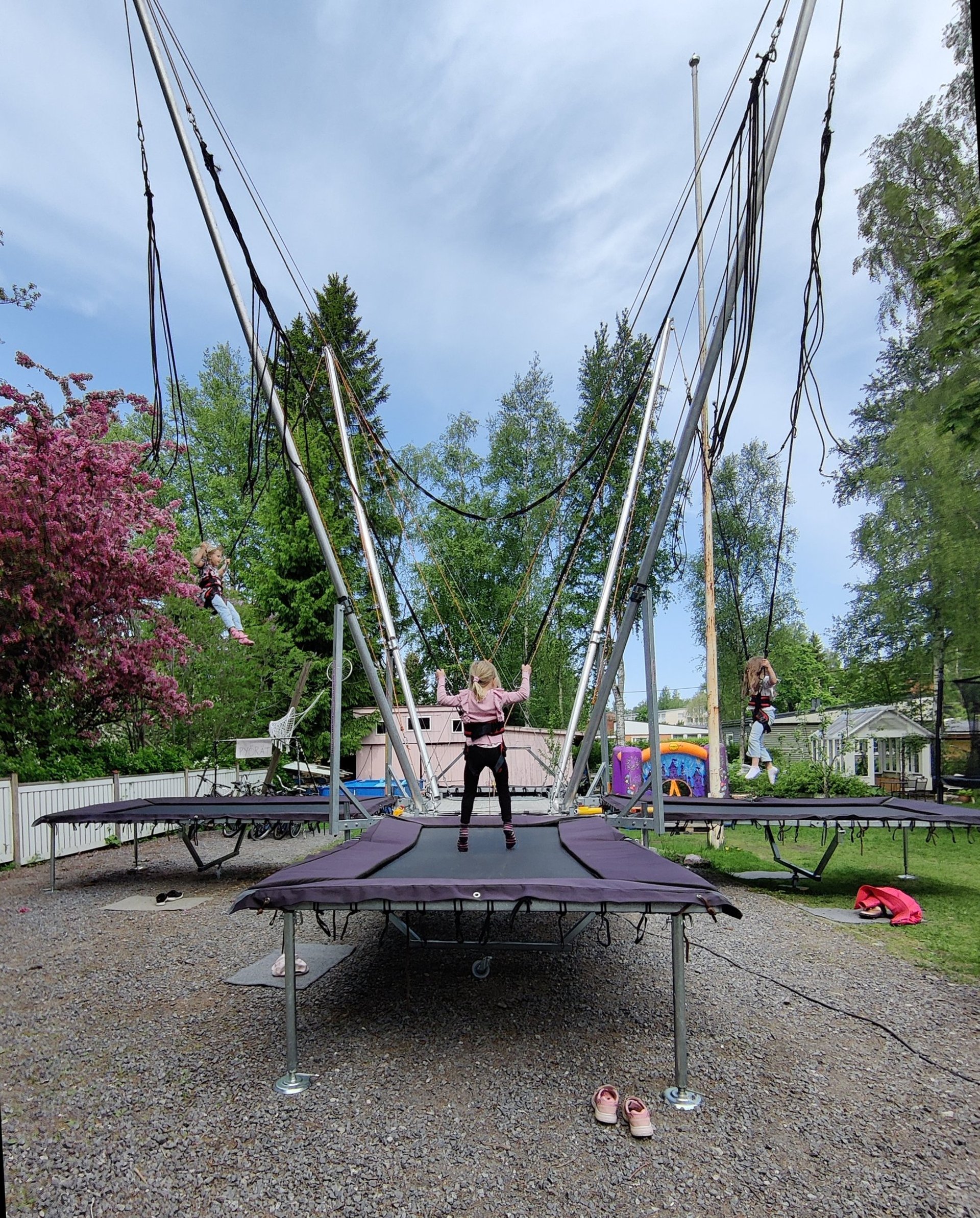 man and woman standing in front of brown concrete building during daytime
