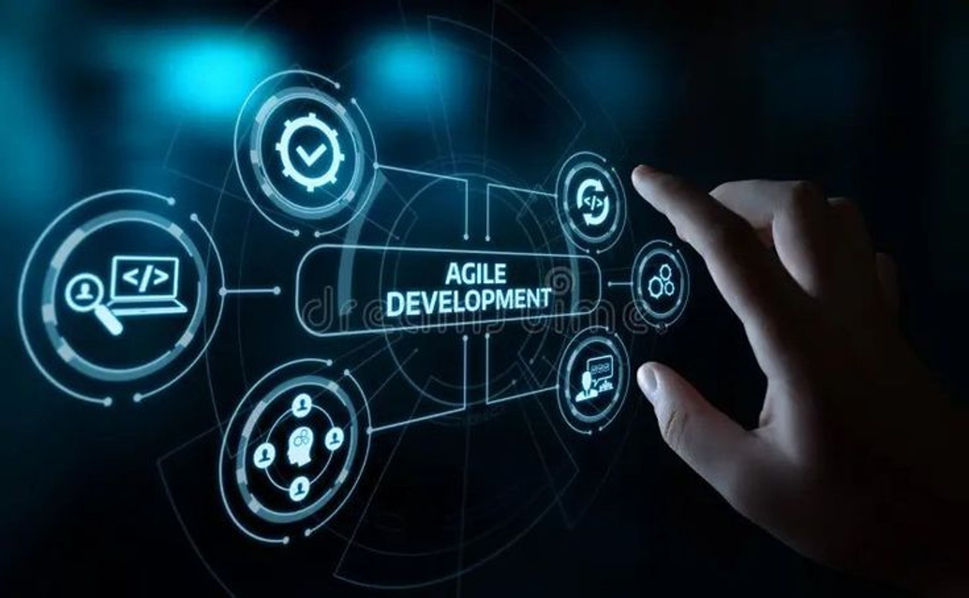 man using laptop in front of brown chair