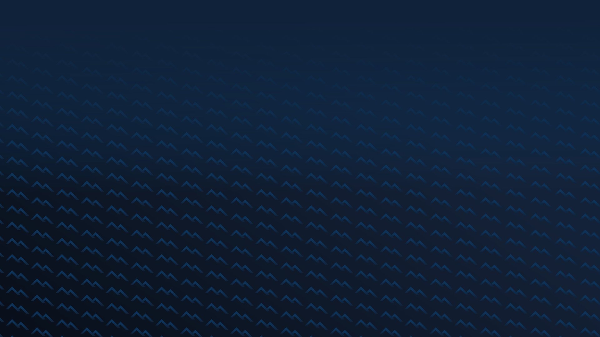 mountain range under blue sky