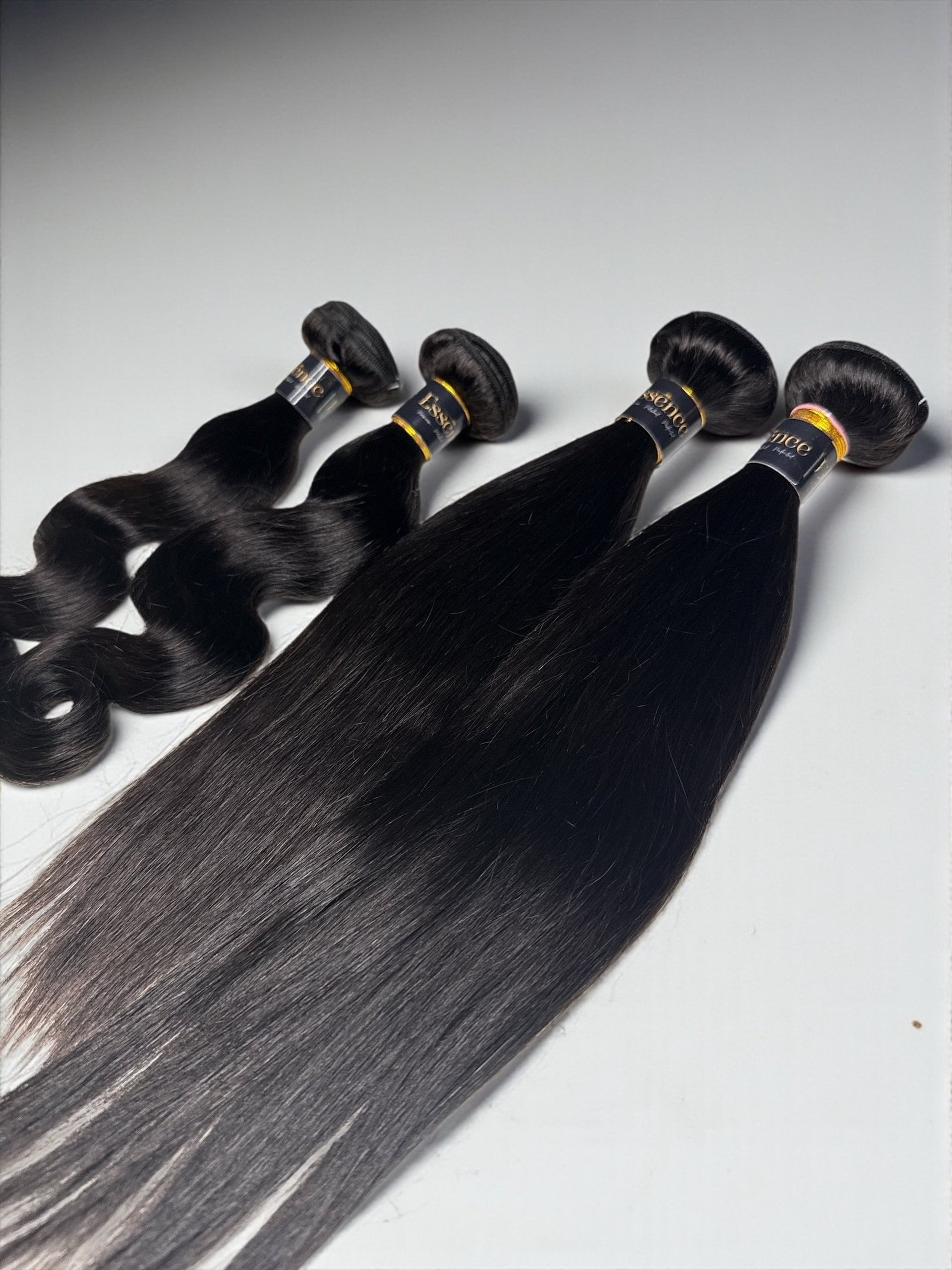 an abstract photo of a curved building with a blue sky in the background