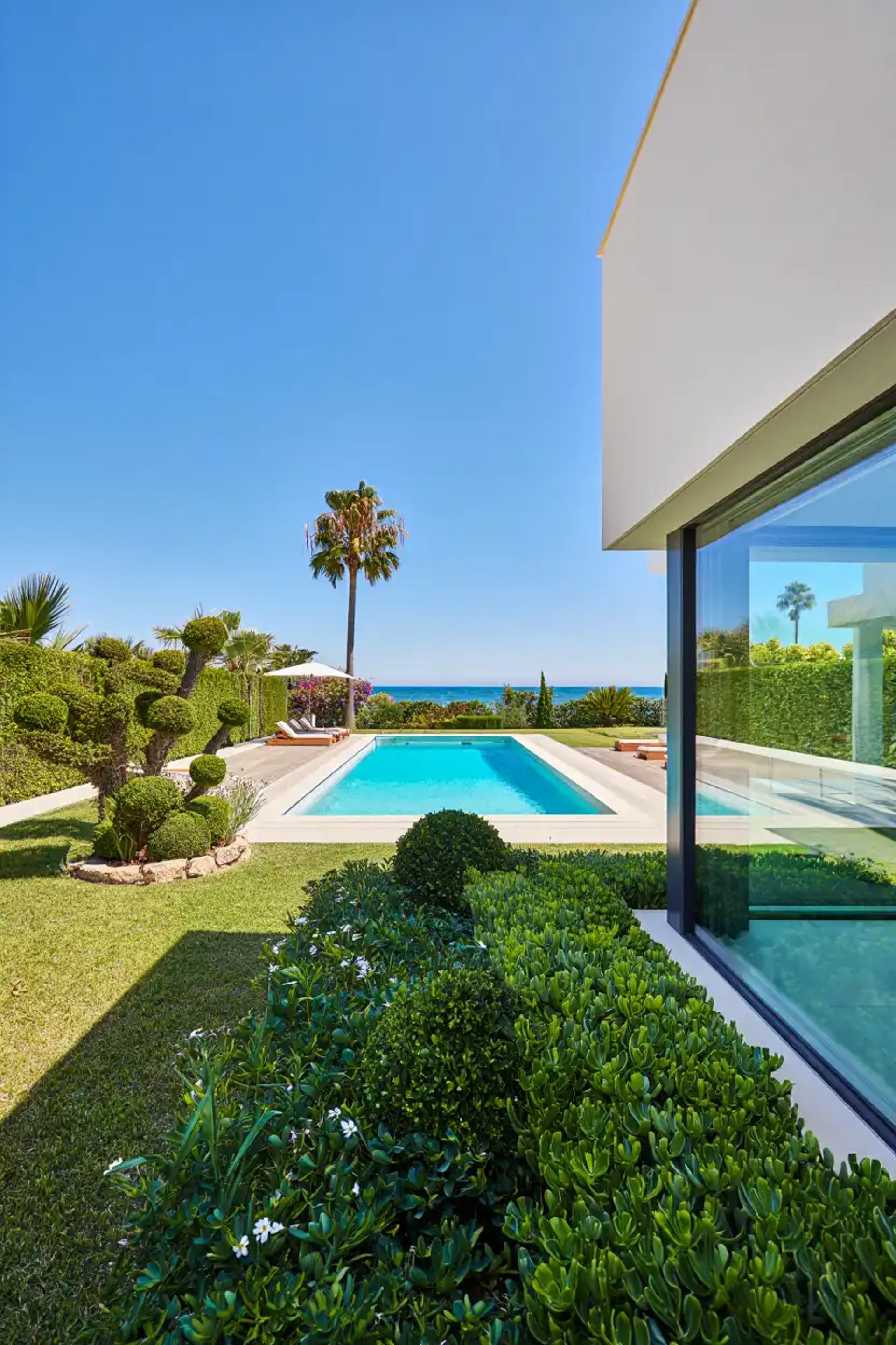 black and brown leather padded tub sofa
