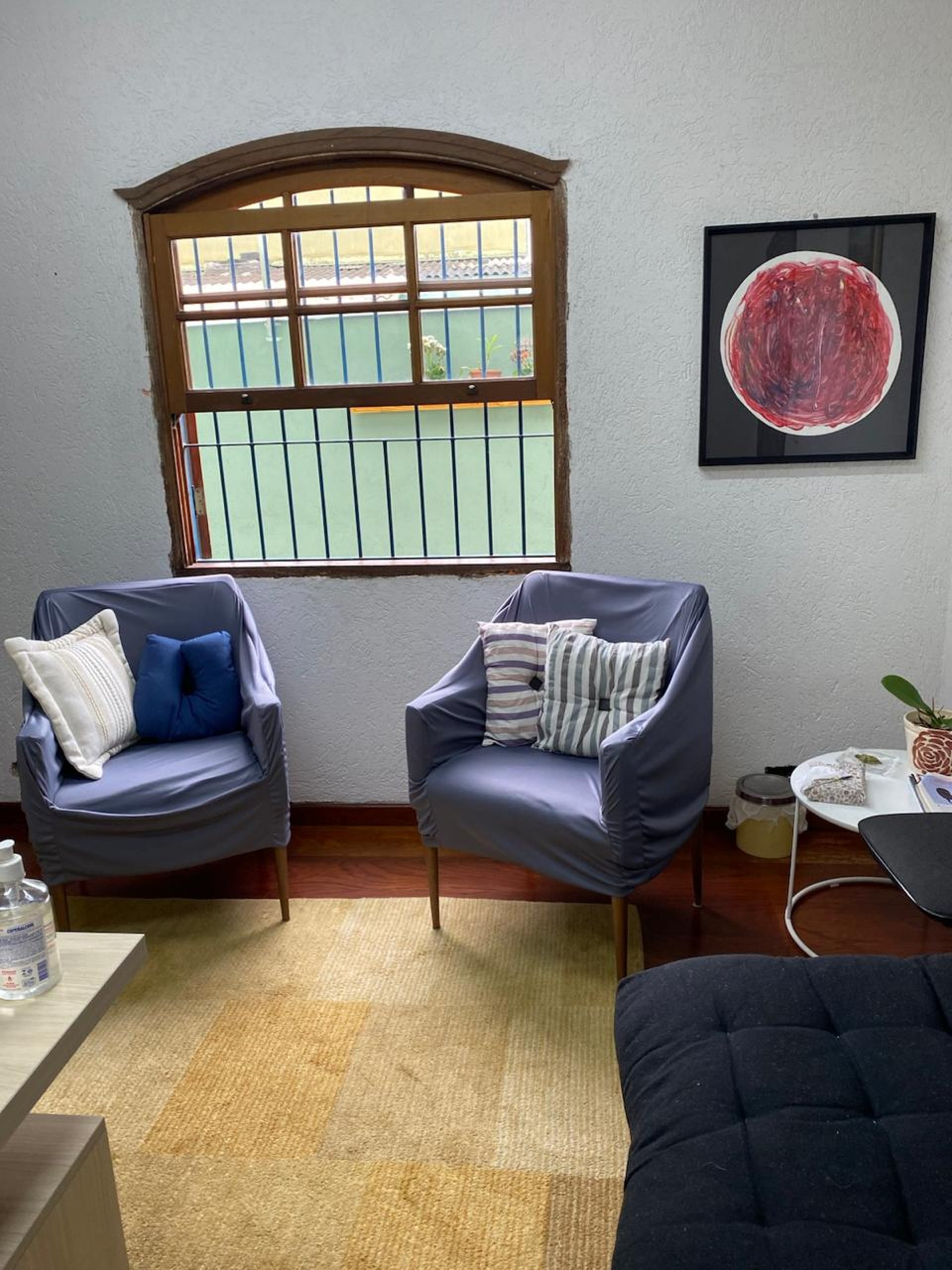 an abstract photo of a curved building with a blue sky in the background