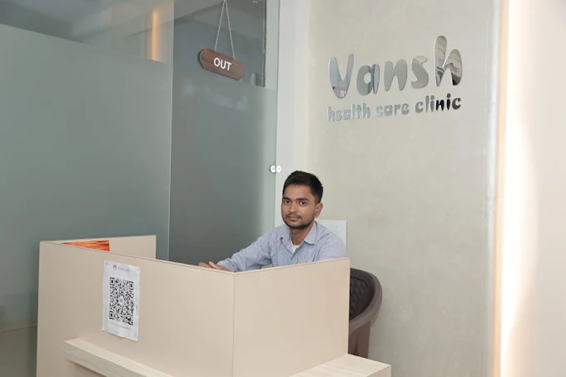 an abstract photo of a curved building with a blue sky in the background