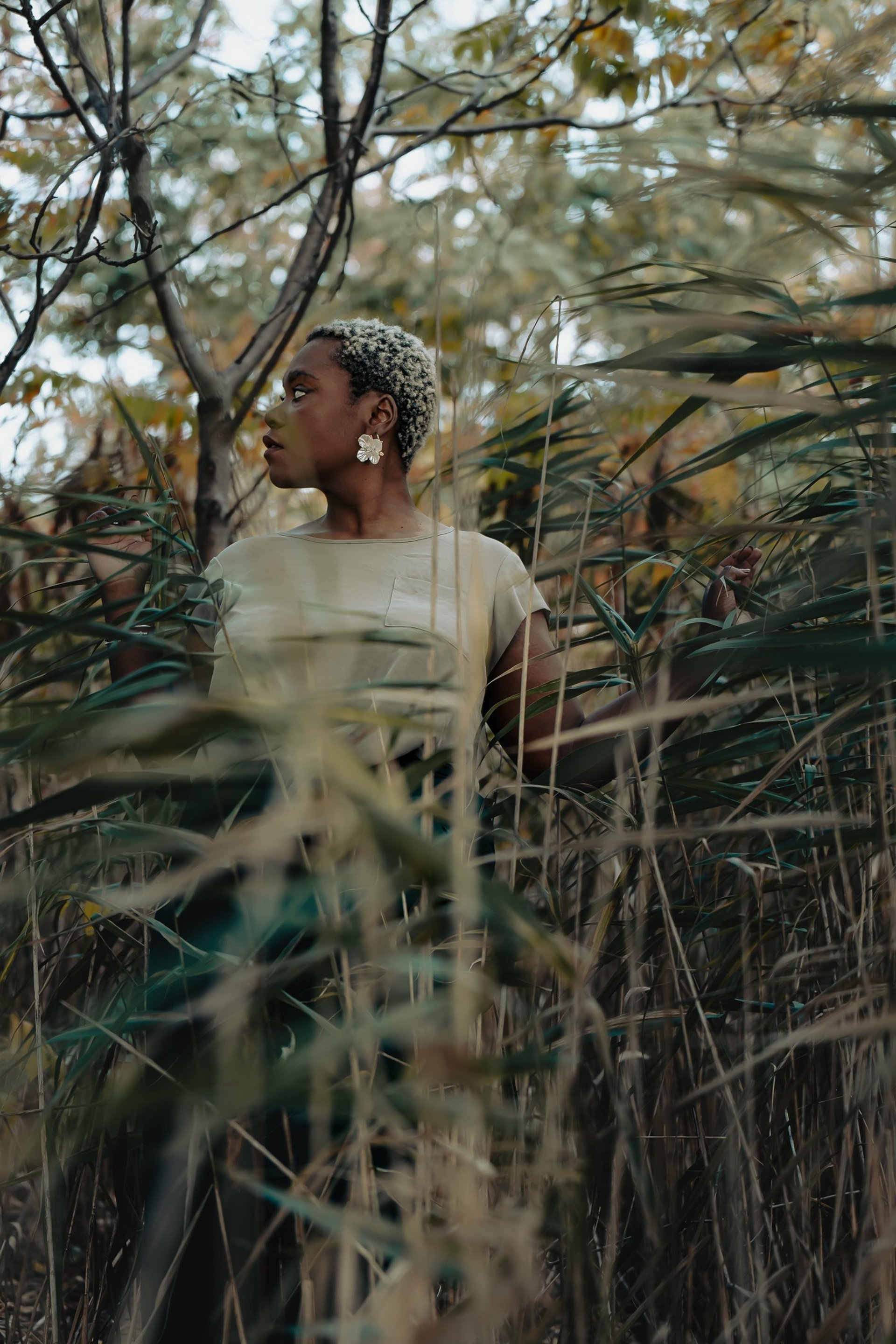 an abstract photo of a curved building with a blue sky in the background
