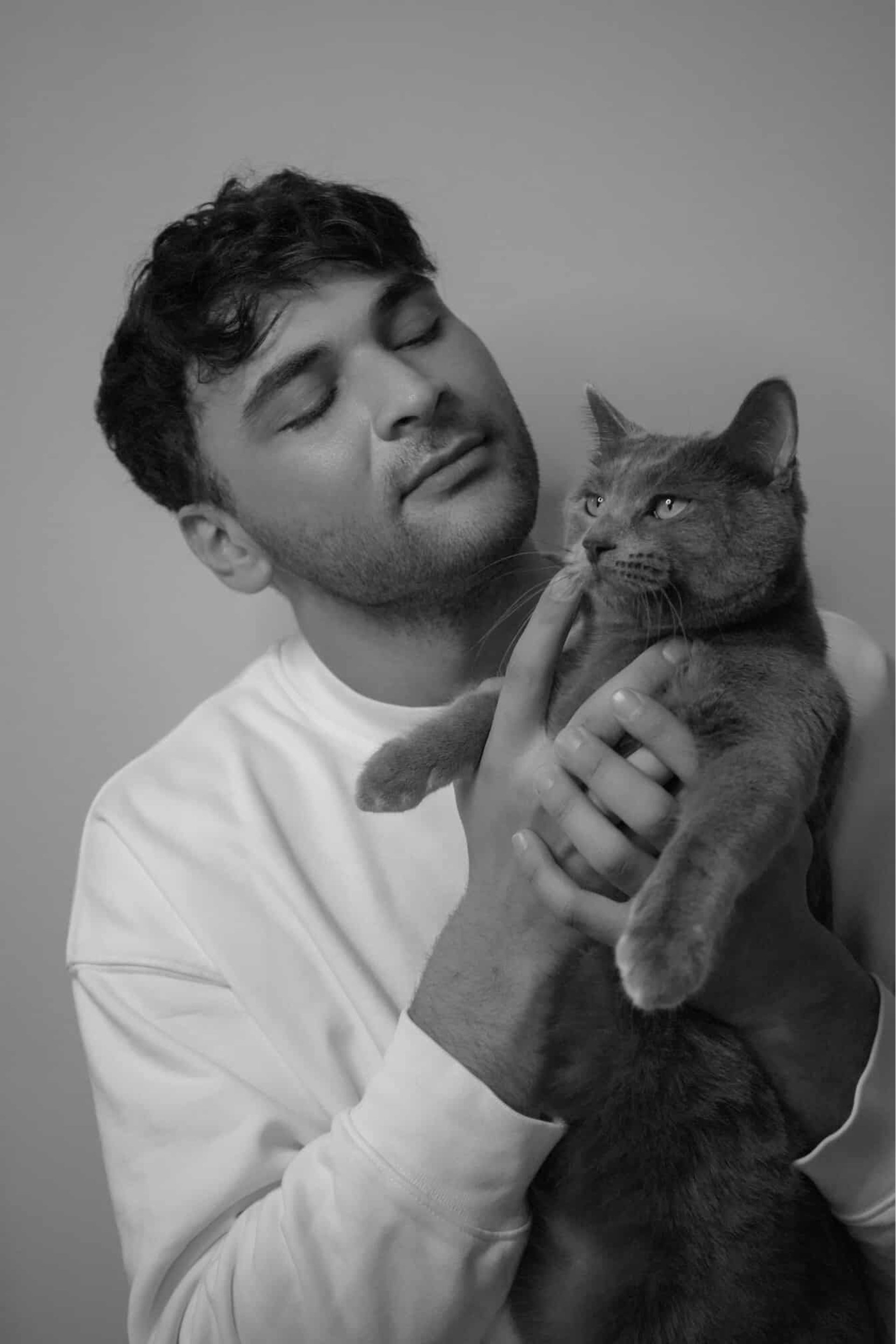 woman wearing yellow long-sleeved dress under white clouds and blue sky during daytime