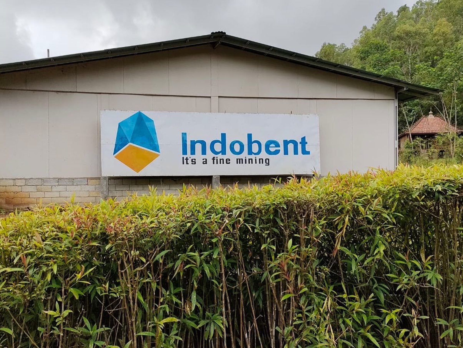 an abstract photo of a curved building with a blue sky in the background