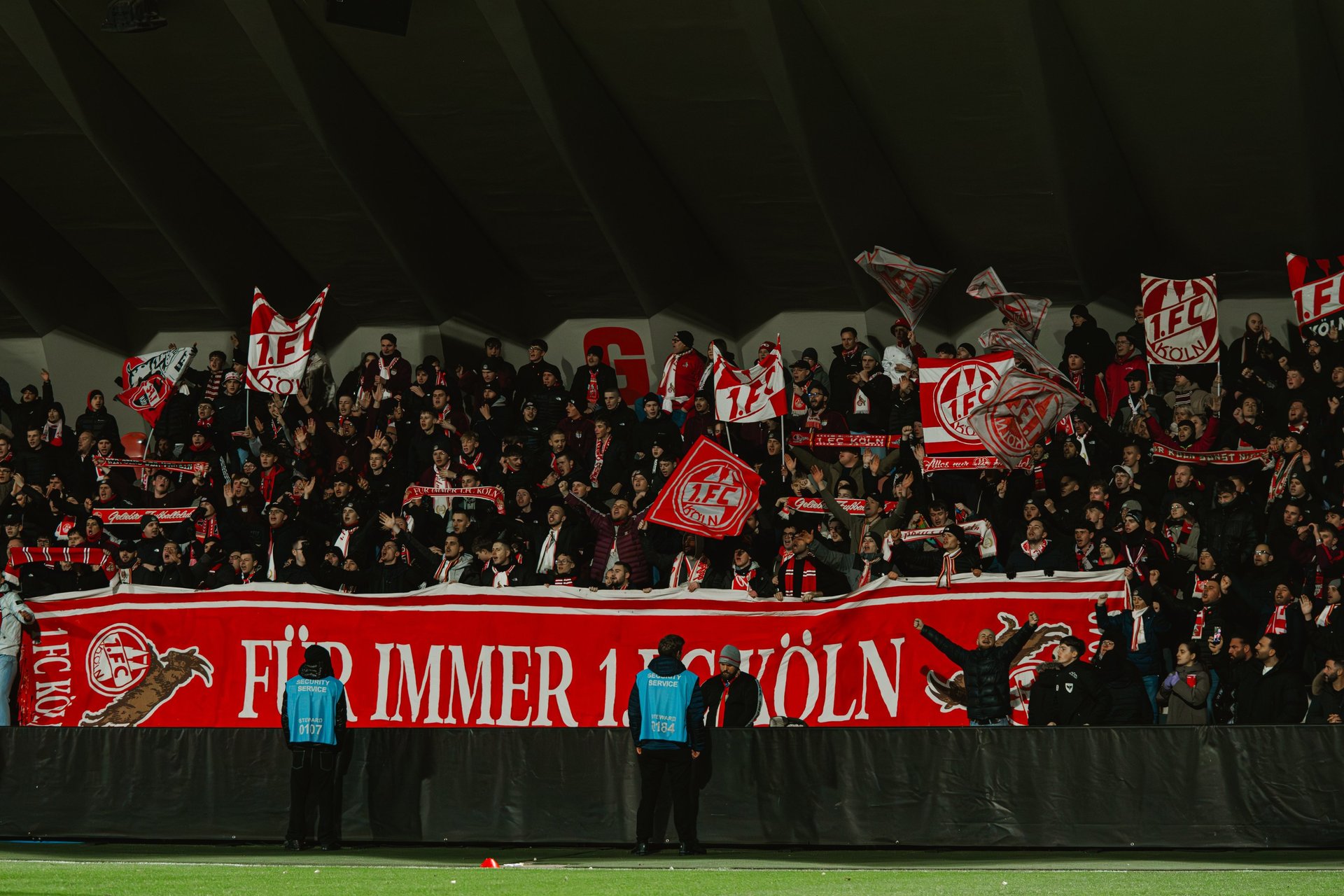 woman wearing yellow long-sleeved dress under white clouds and blue sky during daytime