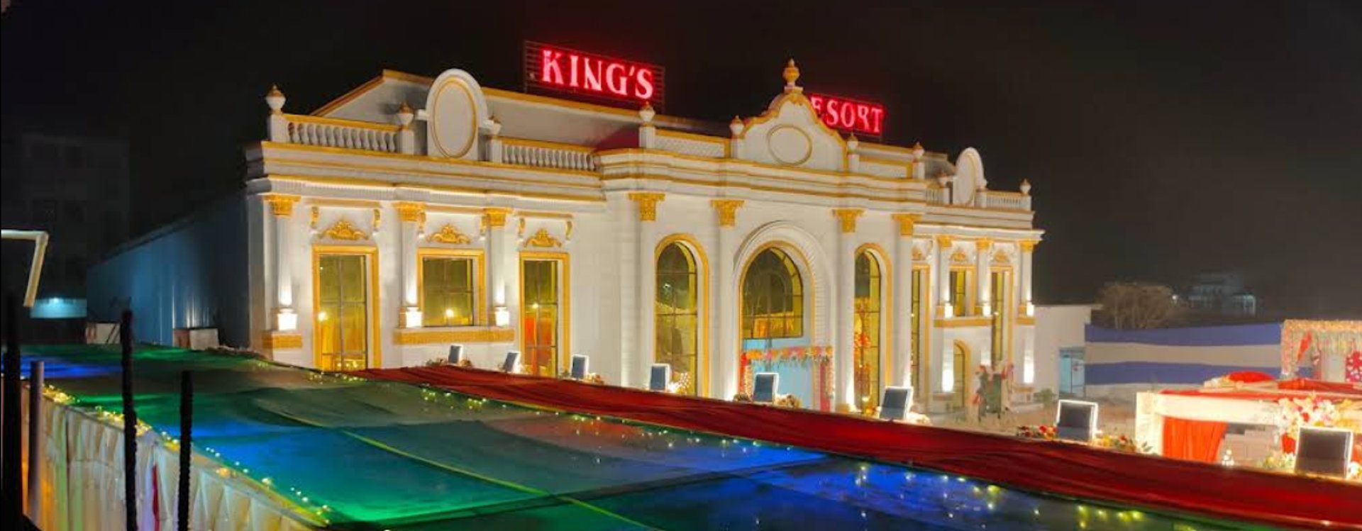 a bedroom with two beds and a balcony