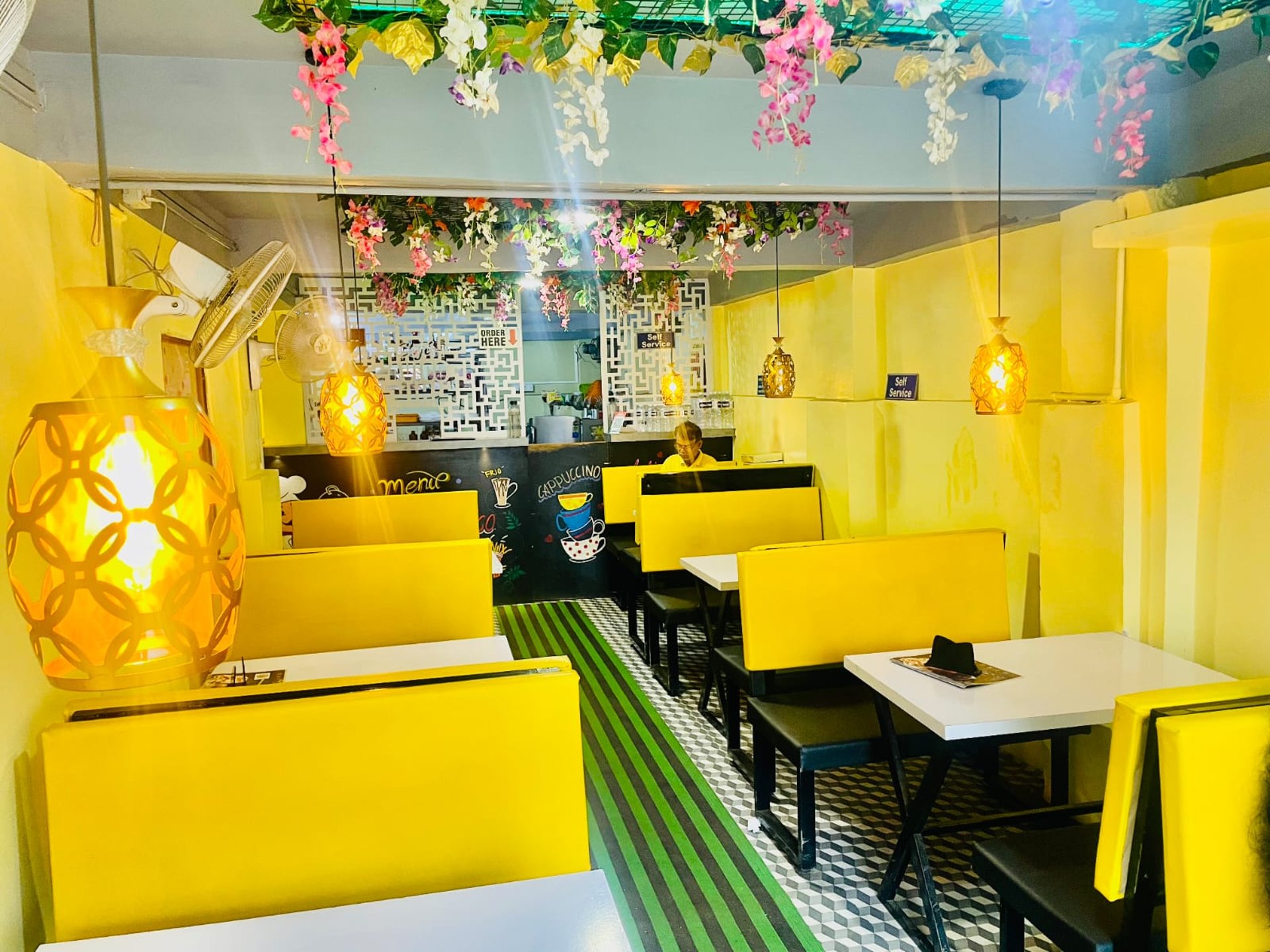 woman wearing yellow long-sleeved dress under white clouds and blue sky during daytime