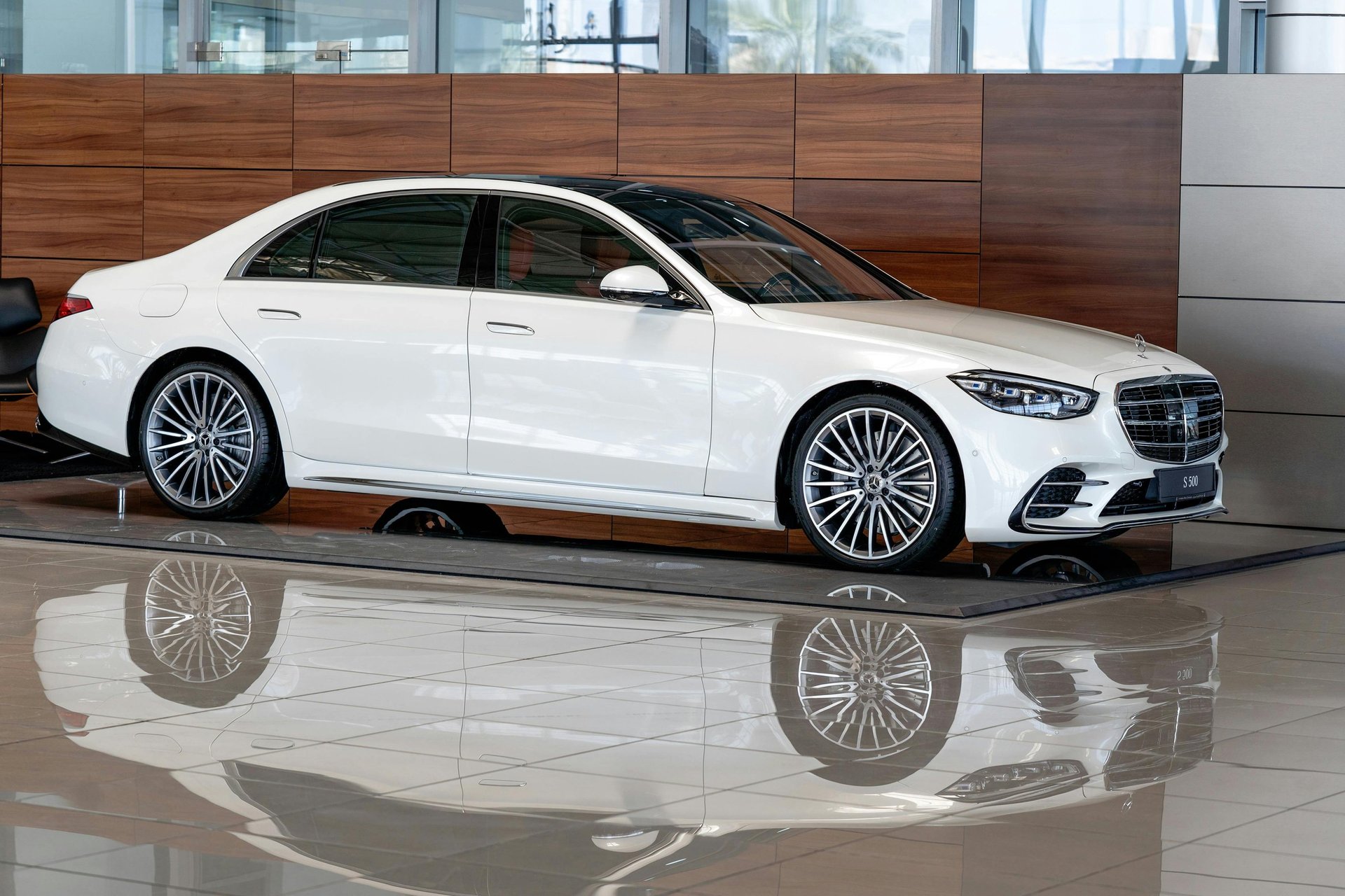 woman wearing yellow long-sleeved dress under white clouds and blue sky during daytime