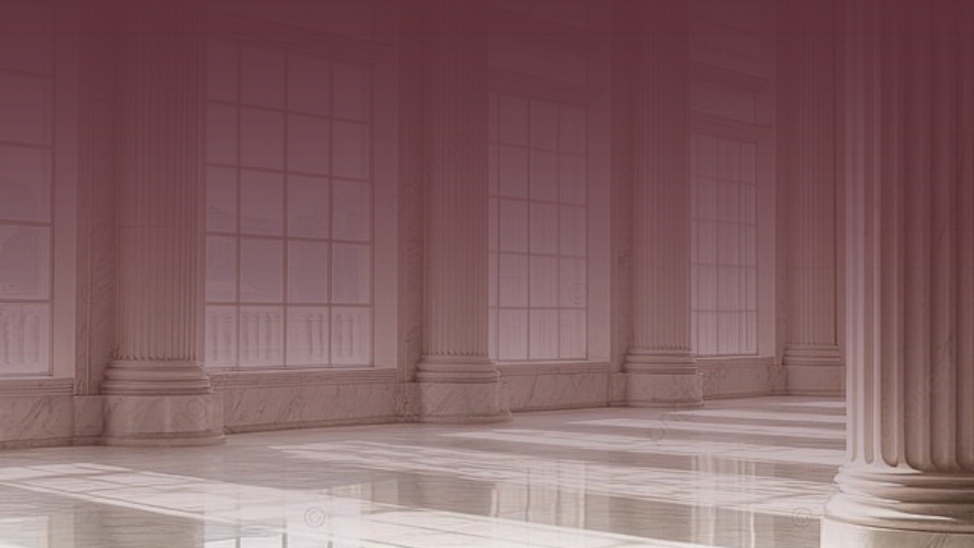 an abstract photo of a curved building with a blue sky in the background