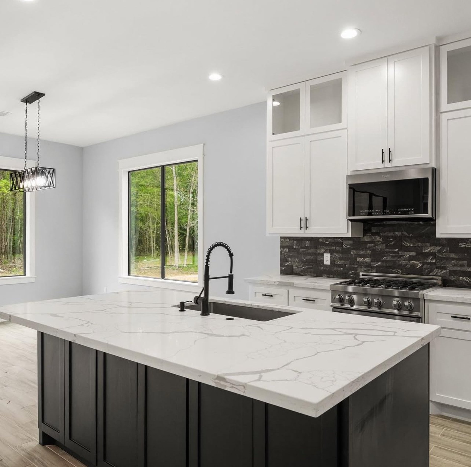 rectangular brown wooden coffee table and gray 3-seat sofa