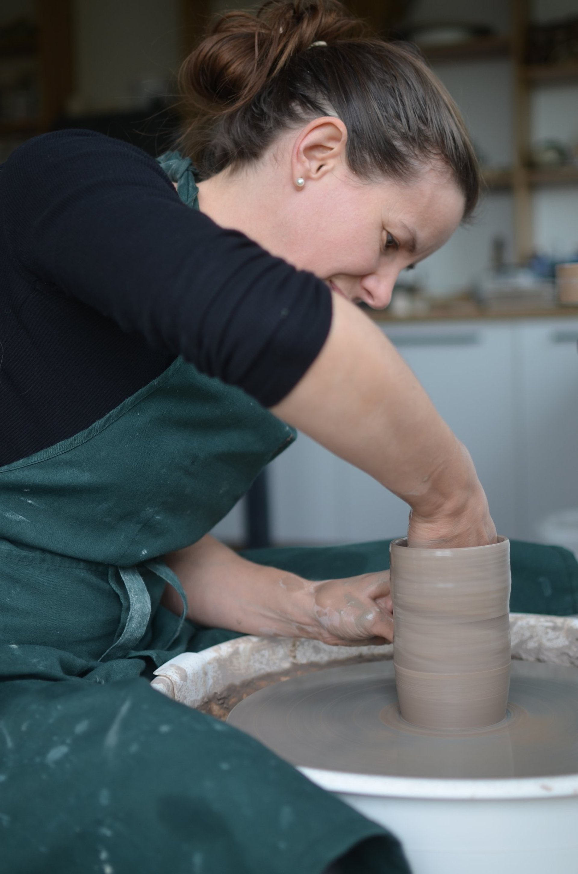woman holding dried flower