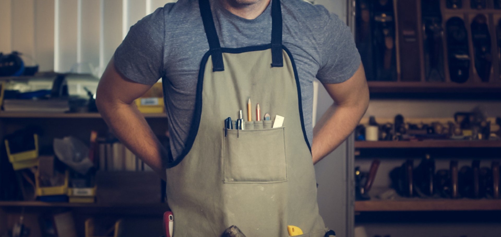 white and brown concrete building near green grass field during daytime