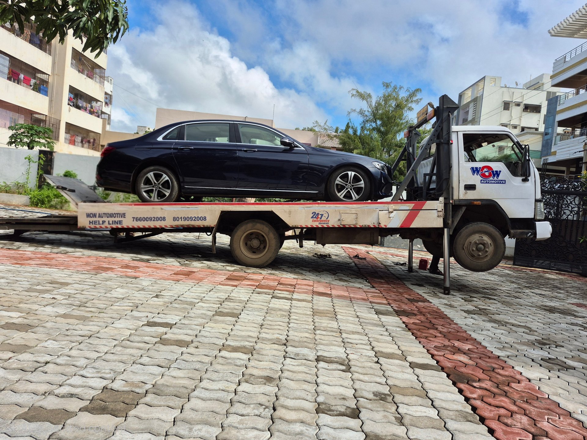 black and brown leather padded tub sofa
