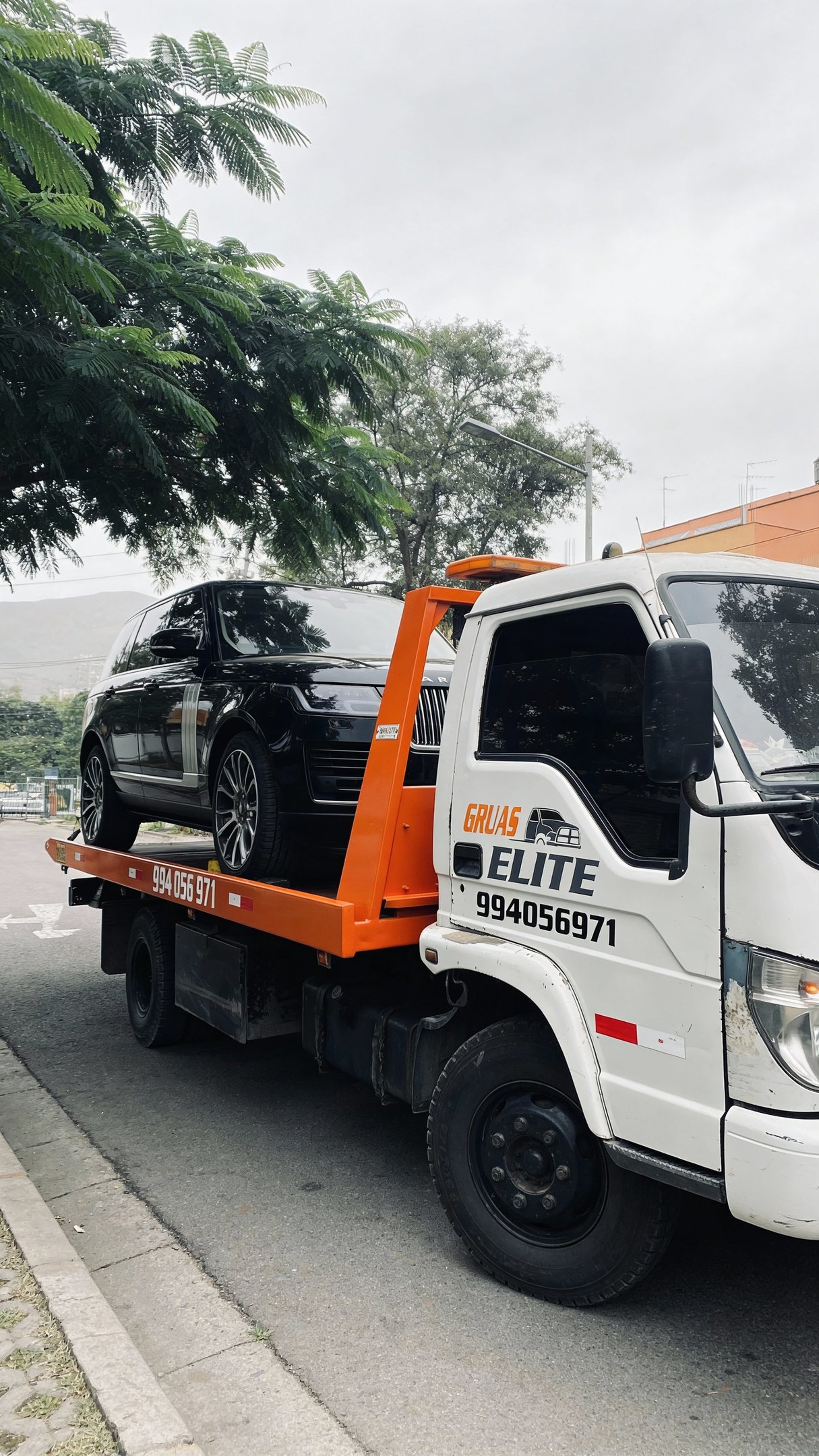 black and brown leather padded tub sofa