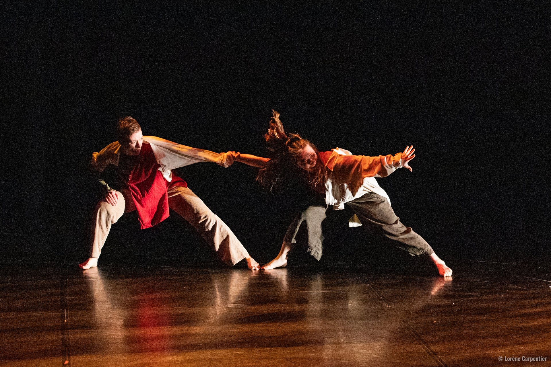 an abstract photo of a curved building with a blue sky in the background