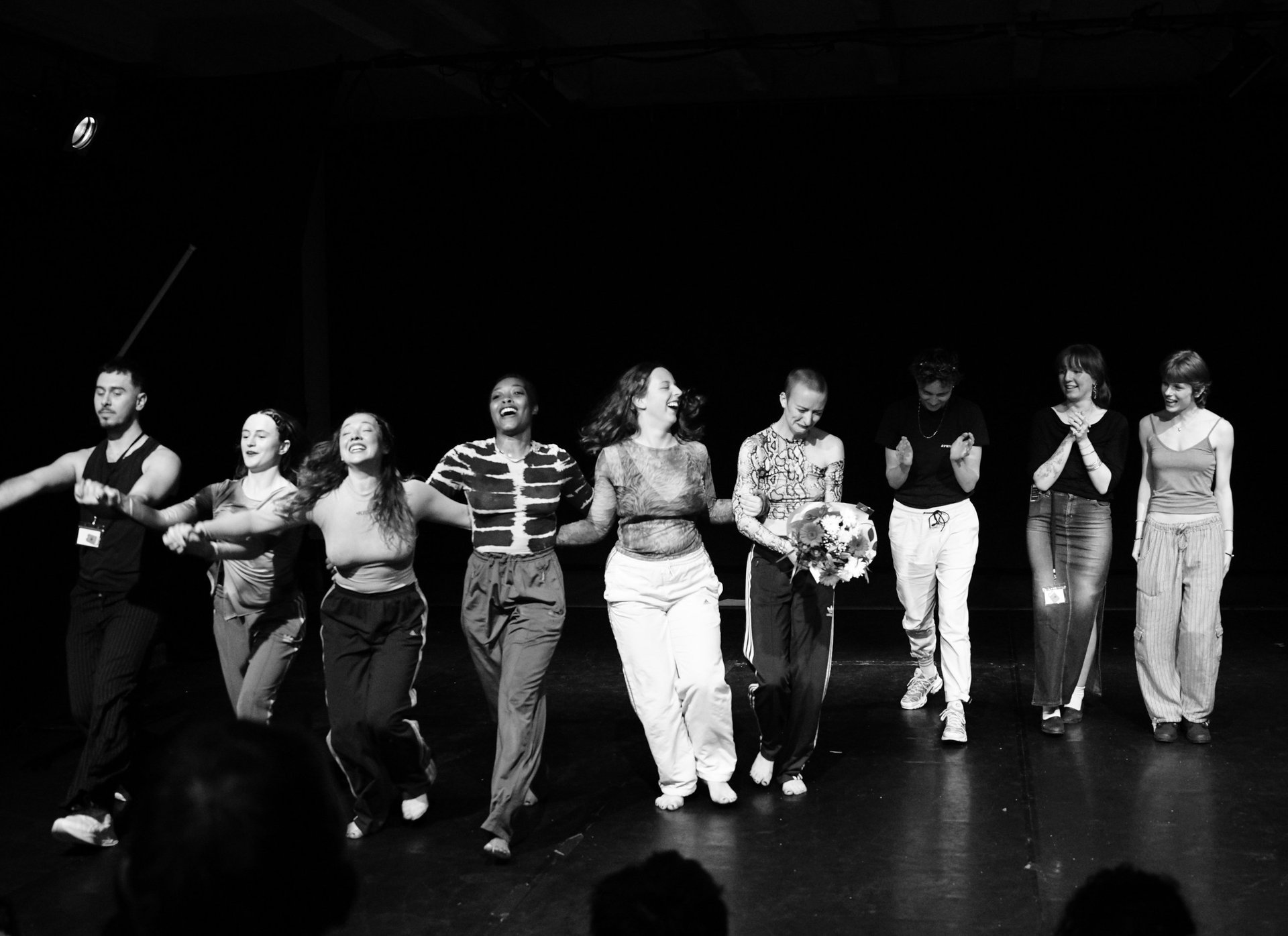 an abstract photo of a curved building with a blue sky in the background