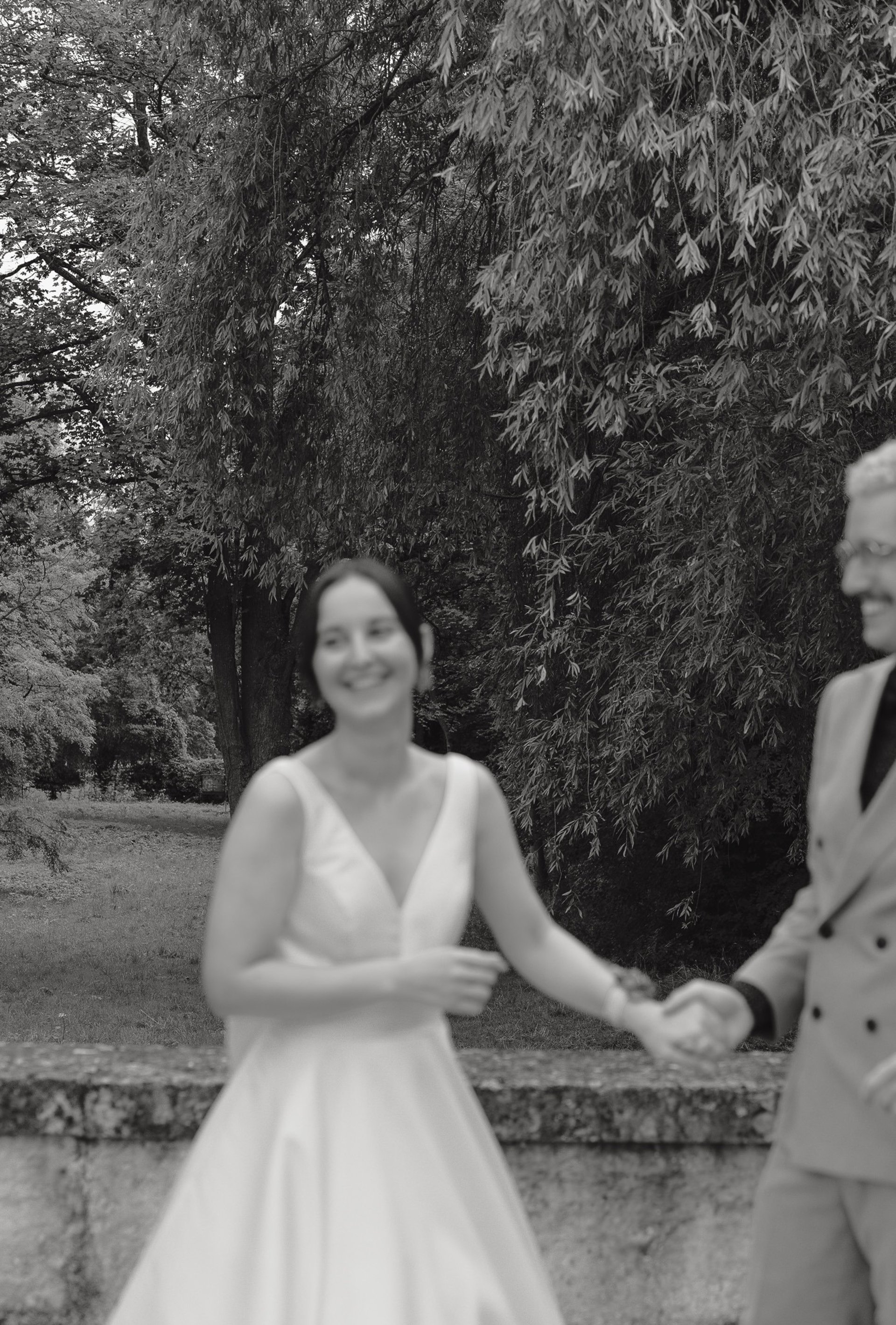 an abstract photo of a curved building with a blue sky in the background