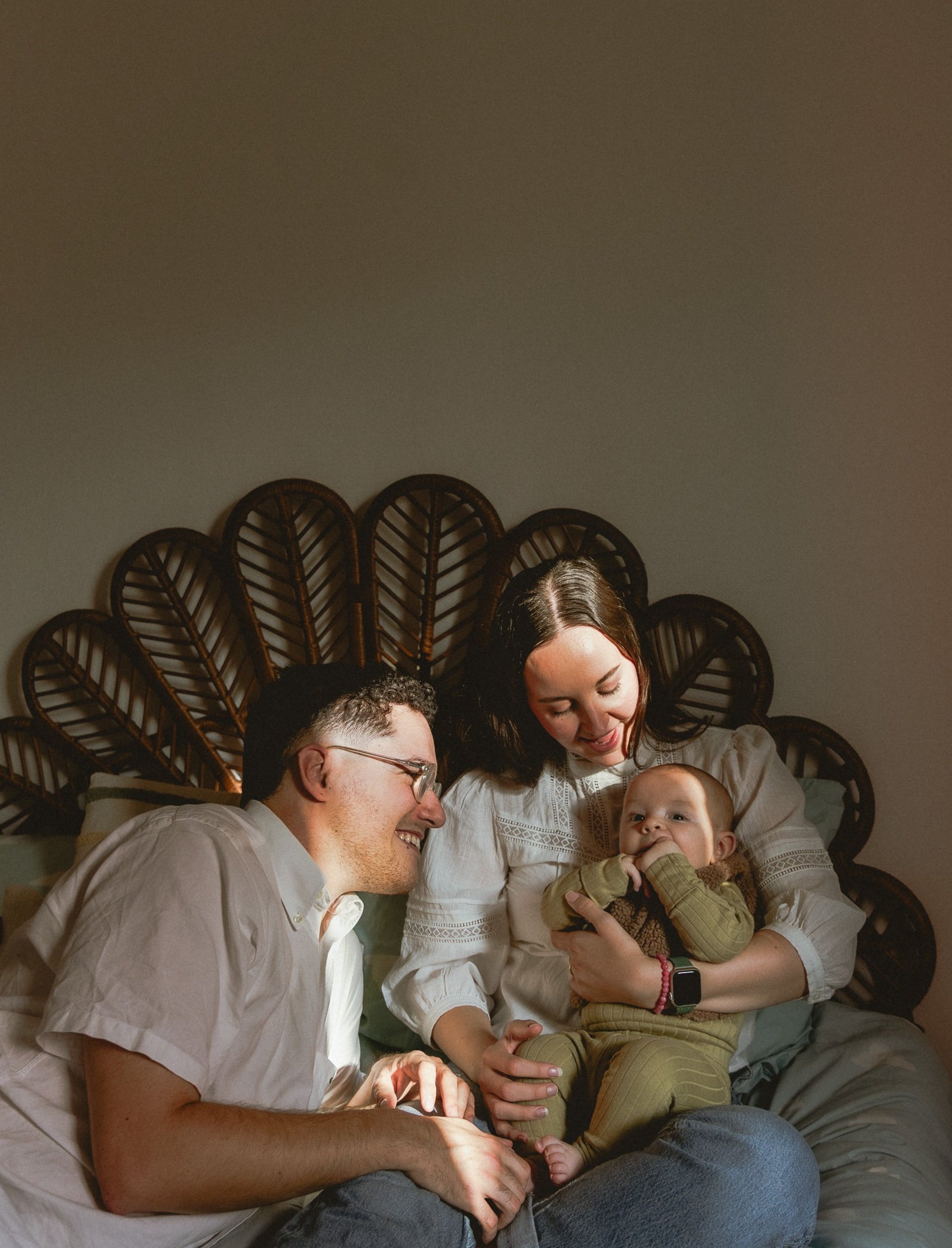 an abstract photo of a curved building with a blue sky in the background