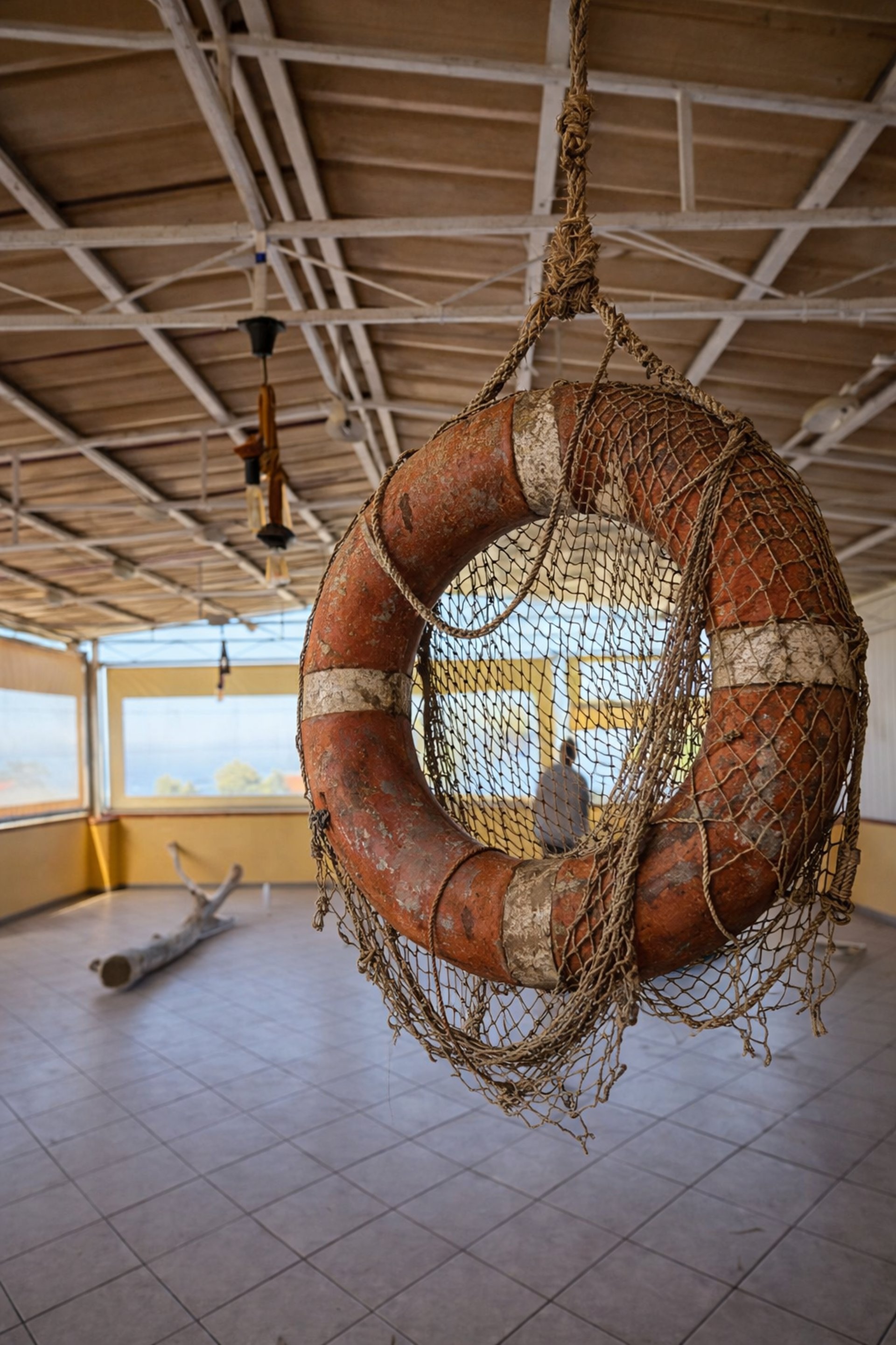 woman wearing yellow long-sleeved dress under white clouds and blue sky during daytime