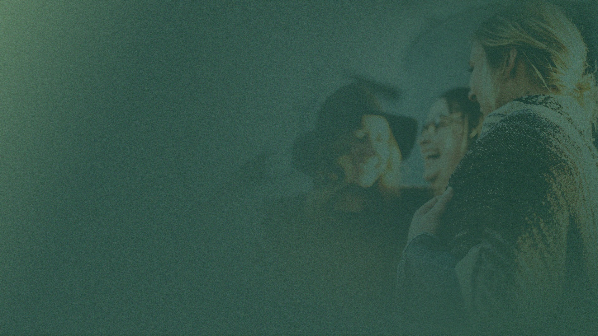 people laughing and talking outside during daytime